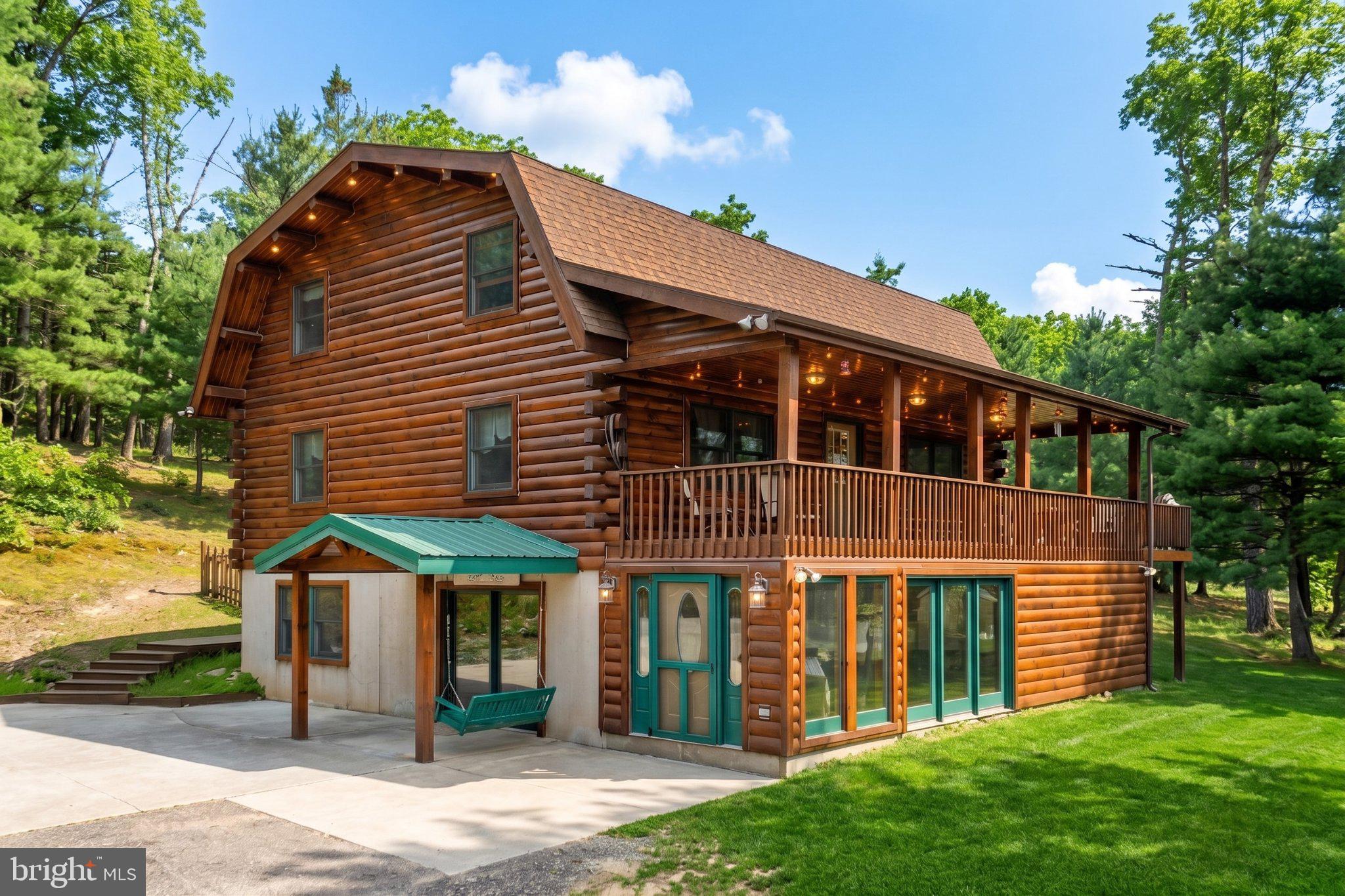 Fantastic location bordering State Game Lands.   Undeniably striking custom log home featuring a beautiful post and beam design with vaulted ceilings, gleaming wood floors, abundant natural light, breakfast nook, and wrap around deck with front/rear covered porches.     Additional heat sources include a coal stove or wood burning fireplace.  The basement offers flexibility for guest quarters, home office, gaming or comfortable additional living space.   Basement was formed with superior walls.  Outside you will find an adorable custom built cottage that perfectly matches the home,  fire pit, picnic area, garden areas, and walking trails.
Truly unique living experience!