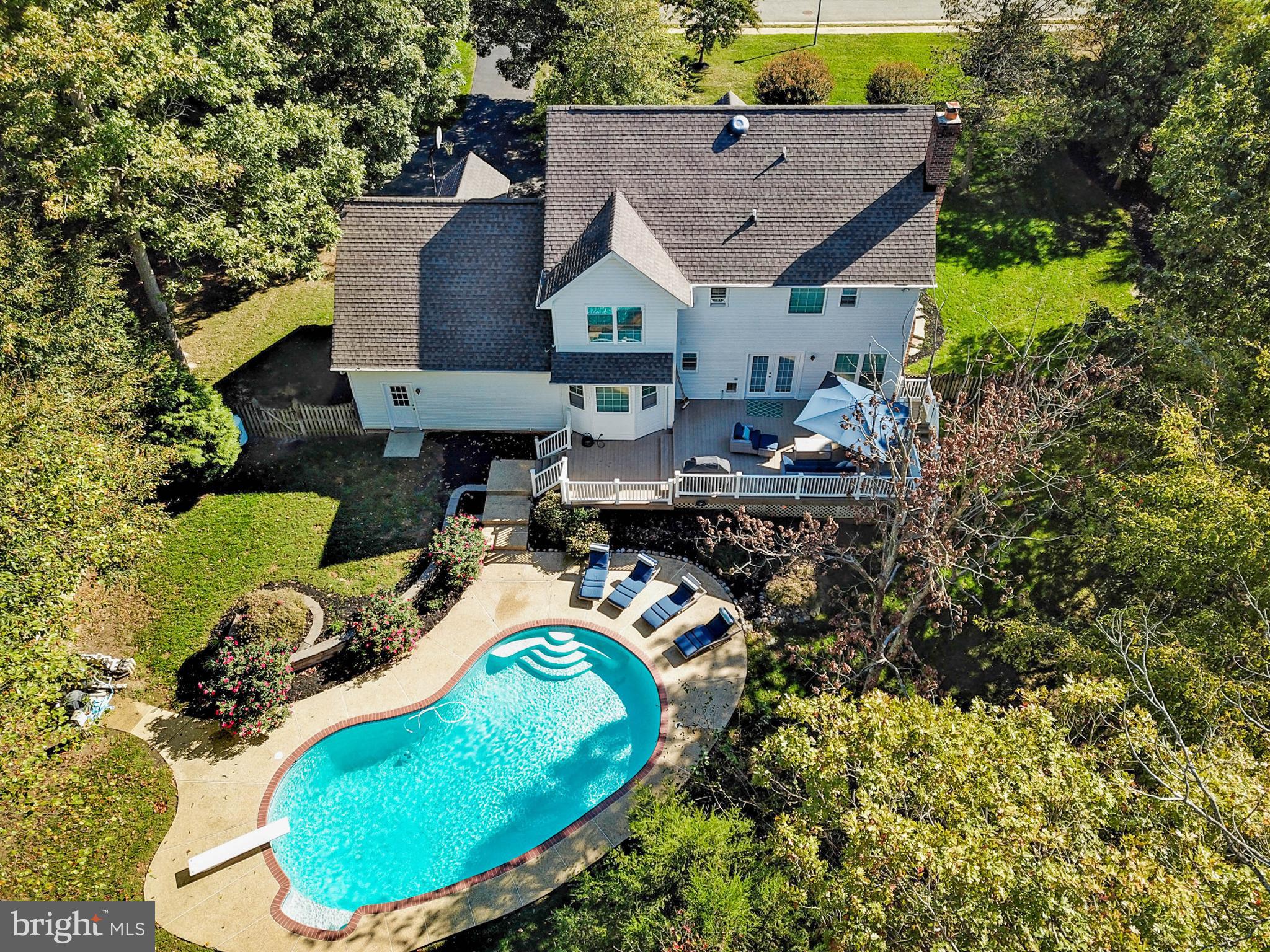 Gorgeous home in sought after Kings Grant community on the East side of La Plata. beautiful hardscaping around the entire house, in-ground sprinklers full yard front & rear. additional paved parking, large full length decking on rear of house stepping down to patio & in ground pool area. Lots of areas to entertain. The basement is full finished with a gorgeous full bath & walk in shower. Flat screen TV's convey. Heated POOL, Heated Floors in newly renovated mstr bath.