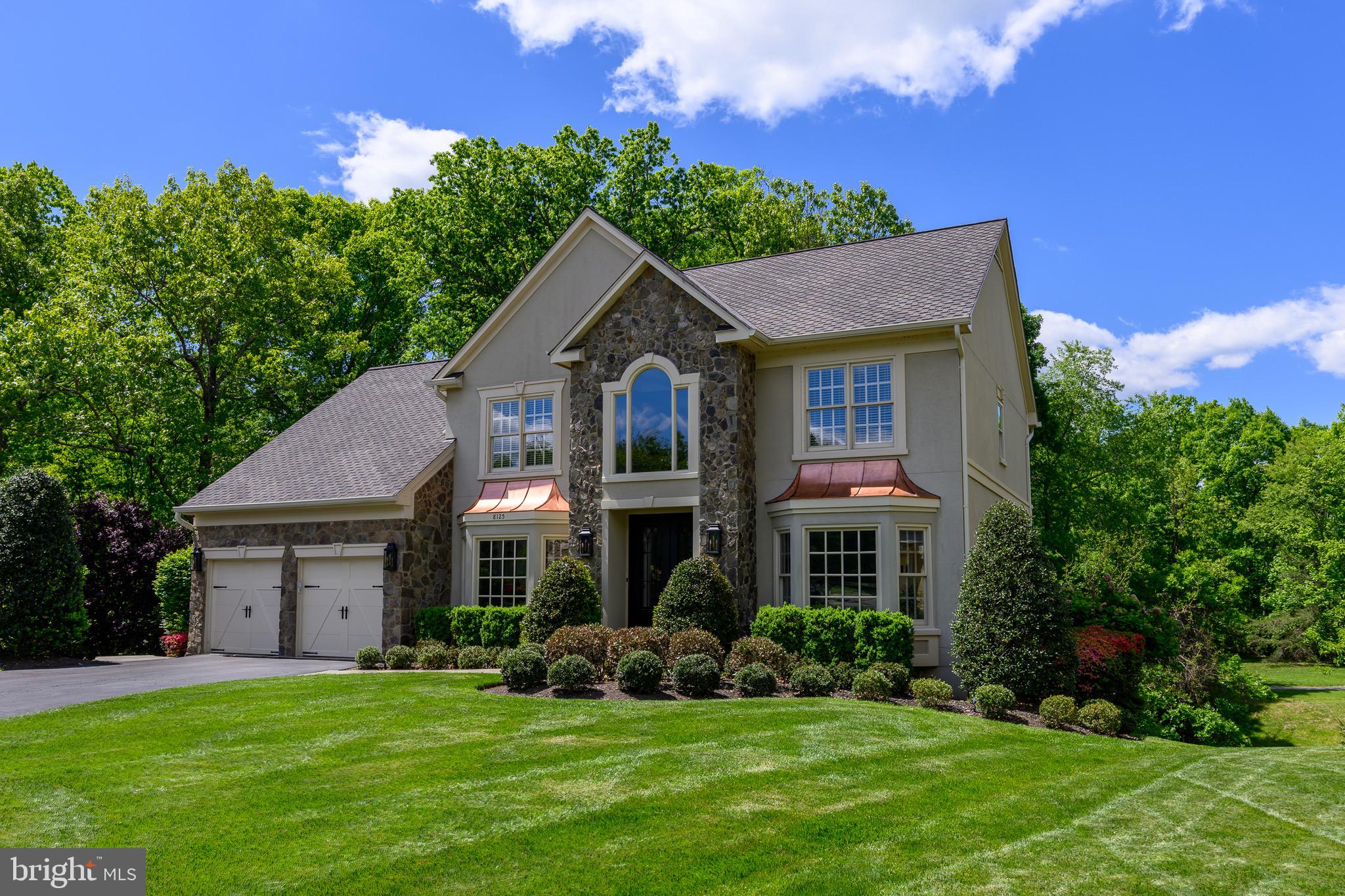 Nestled on a private cul-de-sac in the highly sought-after Lake Manassas community, this extraordinary residence is the definition of turnkey luxury. Backing to serene greenery and meticulously maintained with no detail overlooked, this stunning 5-bedroom, 3 full and 1 half-bath home offers an exceptional blend of timeless elegance, thoughtful upgrades, and modern convenience.

From the moment you arrive, the home's impeccable curb appeal sets the stage, highlighted by a newly paved driveway, a premium 50-year architectural roof, and recently updated HVAC systems and water heater—providing peace of mind for years to come. Inside, exquisite craftsmanship is evident throughout with custom crown molding, impressive 7-inch baseboards, detailed 4-piece door trim, and rich hardwood flooring spanning the main and upper levels, complemented by waterproof hardwood flooring in the finished lower level.

The gourmet kitchen has been beautifully appointed with custom cabinetry, granite countertops, a marble tile backsplash, and stainless steel smart appliances, creating the perfect space for both everyday living and entertaining. The luxurious primary suite serves as a private retreat, featuring a custom-designed dream closet and a spa-inspired ensuite bath complete with a clawfoot soaking tub, dual vanities topped with Turkish marble, and a brand-new sauna.

The fully finished lower level expands the home's living and entertaining space with a custom quartzite wet bar, elegant crown molding, a beautifully renovated bathroom showcasing herringbone marble flooring, and an additional spacious bedroom ideal for guests or multigenerational living.

Outdoor living is equally impressive with newly installed Trex decking on both the rear and side decks, a tranquil fountain with a brand-new pump, and a private setting perfect for relaxing summer evenings or hosting gatherings. Further enhancing the home's appeal is a comprehensive smart home system featuring smart switches, outlets, Nest thermostats, security cameras, and more.

A rare opportunity to own a truly exceptional home in one of the area's most prestigious gated communities. Every upgrade has been thoughtfully completed so you can simply move in and enjoy. Schedule your private tour today.