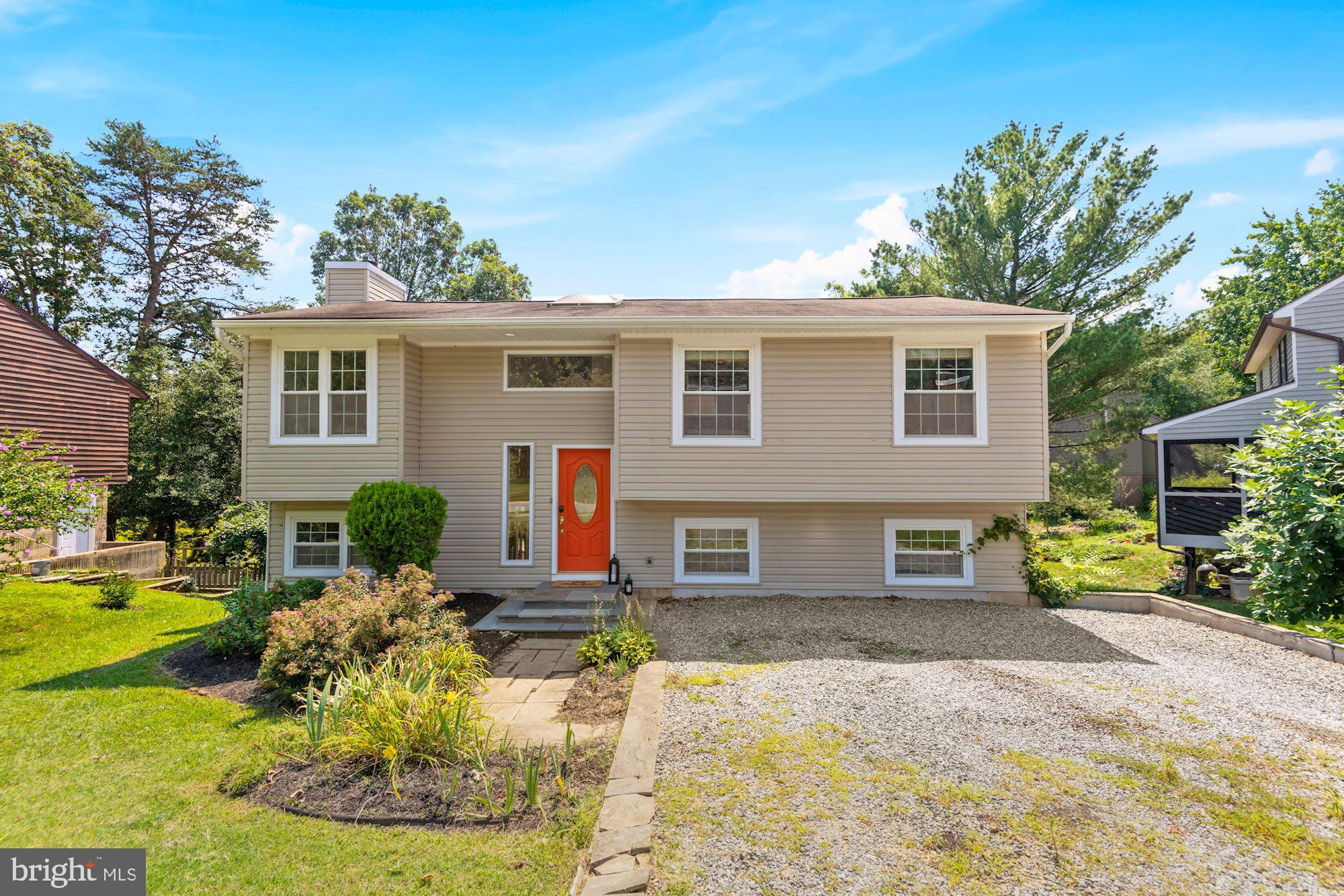 Gorgeous split foyer in the heart of the Broadneck Peninsula a stone's throw away from Broadneck High School.  The master on the lower floor is wonderfully done with a spa like retreat -  oversized shower, large jacuzzi tub and walk in closet await the lucky new owners.  The kitchen upstairs was completely opened for wonderful entertaining and dining area all accented by a large skylight providing awesome natural light.  The upstairs bath is a beautiful companion to the master and features double sinks, separate tub and oversized stand up shower.  The outside entertaining area is second to none at this price point - oversized deck, huge outdoor patio, fully fenced AND overlooking serene and private open space!!  Priced aggressively for a quick sale - don't hesitate on this one!!
