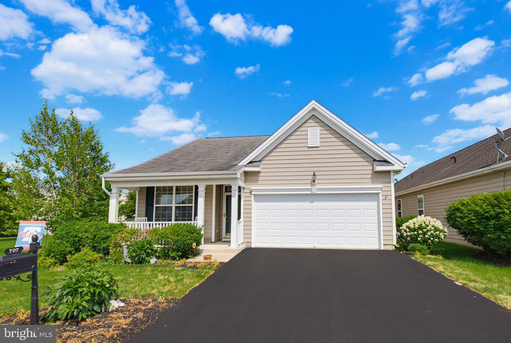 Enjoy easy, move-in ready one-story living in the sought-after 55+ community of Four Seasons at Elm Tree in Mount Joy! This beautifully maintained home offers the perfect blend of comfort, style, and convenience. A welcoming hardwood foyer opens to spacious formal living and dining rooms accented with elegant crown molding and chair rail. The bright eat-in kitchen is sure to impress with hardwood flooring, upgraded countertops, a center island, recessed lighting, pantry, and gas cooking with a double oven. Just beyond, the inviting family room features a cozy gas fireplace, ceiling fan, and custom built-in cabinetry, while the adjoining sunroom with its vaulted ceiling provides the perfect space to relax or entertain year-round. The private primary suite boasts a vaulted ceiling and an en-suite bath complete with a soaking tub and separate stall shower. Two additional bedrooms and a full hall bath provide comfortable accommodations for guests or a home office. A convenient mudroom/laundry room, pull-down attic storage, and an oversized two-car garage add everyday functionality. Step outside to enjoy your choice of the charming covered front porch or the private rear patio. Residents of Four Seasons at Elm Tree enjoy exceptional amenities, including a community clubhouse, swimming pool, and scenic walking trails, making this the ideal place to enjoy an active, low-maintenance lifestyle. Schedule your showing today!