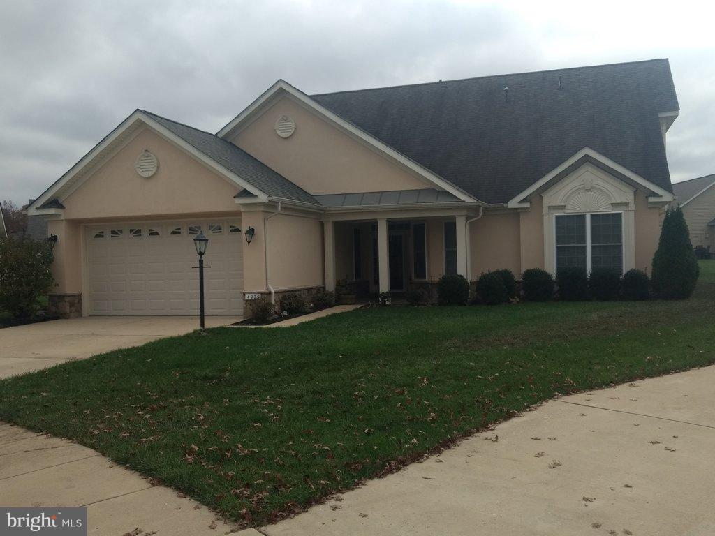 Wonderful single family home in active adult community with 3 BR, 3 BA, 2 car garage, gas fireplace, 9' ceilings, master suite and additional BR on 1st floor. Lovely kitchen features 42" cabinets, Corian counters and sink, and loft/BR upstairs.