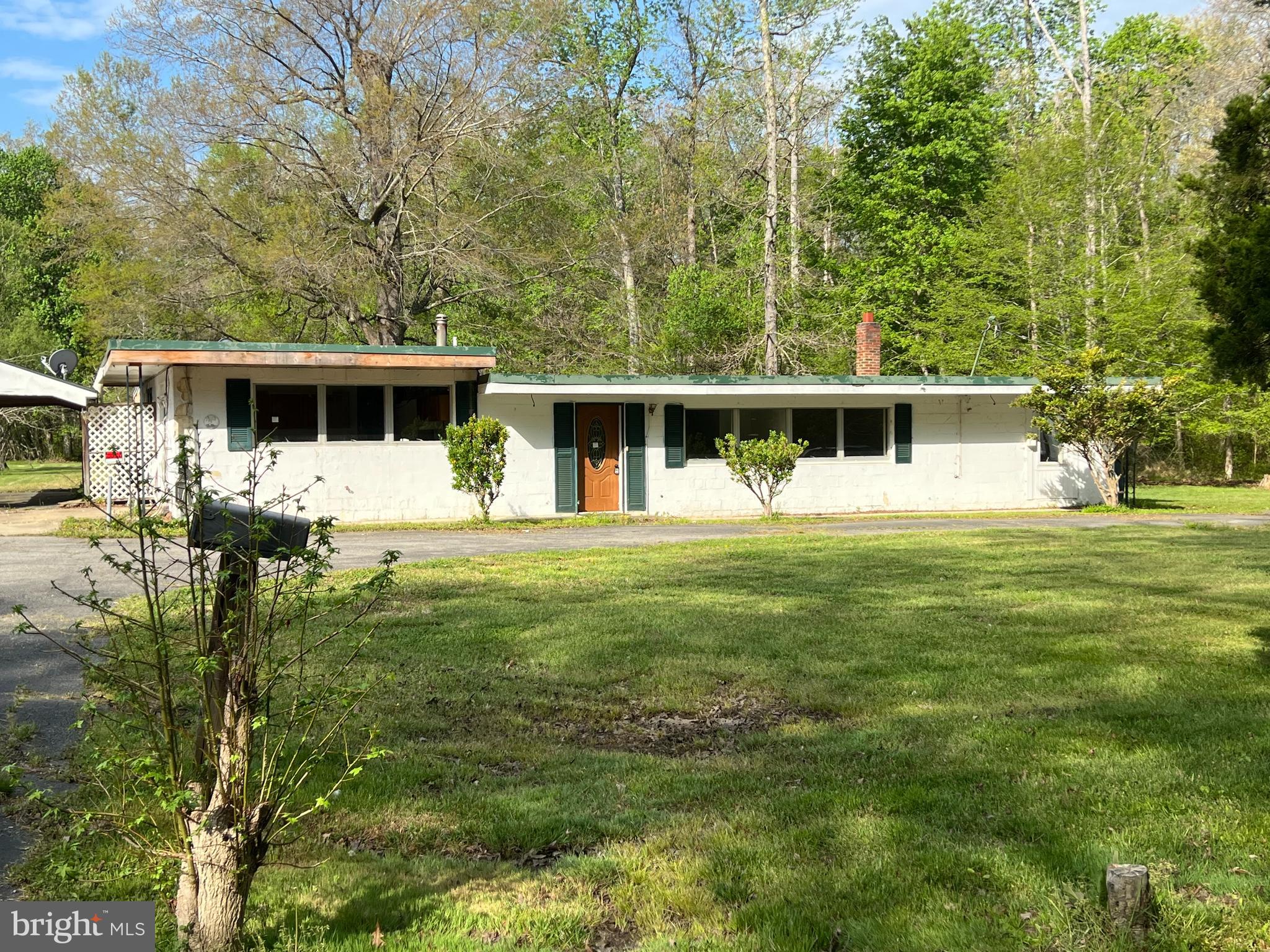 Drastically Reduced! Welcome to 6705 Bumpy Oak Road - a rare chance to own a spacious 2.58-acre property offering peace, privacy, and endless potential. Nestled in a quiet setting, this property features a clean, flat lot ideal for expansion, outdoor living, or creating your dream retreat.
This home is a true fixer-upper, perfect for investors, builders, or buyers looking to bring their own vision to life. With some TLC, this property can be transformed into something truly special.
A standout feature of this property is the separate, spacious apartment with its own private entrance, offering excellent rental income potential. The apartment includes three generously sized bedrooms, making it ideal for tenants, extended family, or multi-generational living.
Conveniently located just minutes from Routes 210 and 301, you'll enjoy easy access to dining and everyday conveniences - while still appreciating the tranquility of country living. 
Don't miss this opportunity to create value and make this property your own!