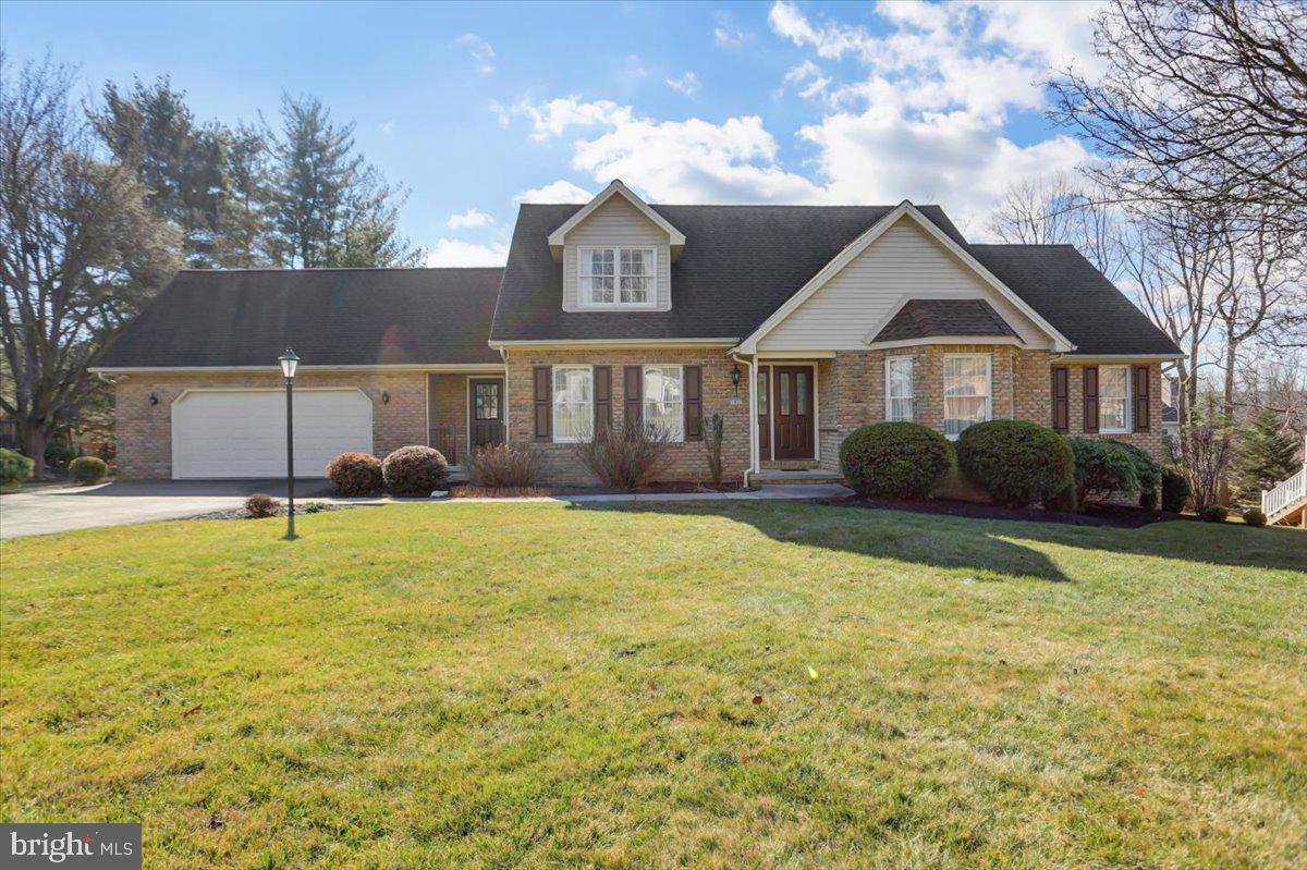 Very well maintained 4 bedroom 2.5 bath 2 car garage cape cod located on a well landscaped lot in Middletown school district. This home features a large first floor owners suite with full bath and walk in closet. Kitchen  has granite counter tops,  and black appliances. The large family room has some built ins. Enjoy the propane brick fireplace in the sun room with access to the partially covered trex deck.  The first floor also has a formal living and dining room for family get togethers. The second floor has three good size bedrooms, full bath and office or storage area.  The unfinished basement has its own propane heater, was used to heat wood working area. Don't miss this home.