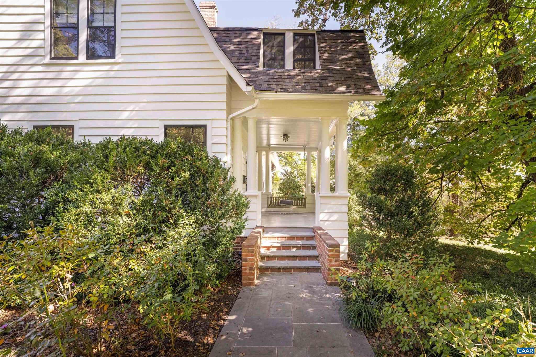 Linden Hill is one of Charlottesville's most distinguished properties, set on over 1.3 acres of beautifully manicured grounds with impressive mountain views. This iconic 1920's home includes two charming cottages and a heated, saltwater pool and spa, offering a luxurious yet private retreat just minutes from downtown, the University of Virginia, shopping, schools, and clubs. Meticulously restored, this Arts and Crafts-inspired residence features unparalleled craftsmanship and high-end finishes throughout. The perfect mix of new systems with the patina of a historic residence. The gourmet kitchen boasts a Lacanche range, a free-standing Subzero refrigerator, quartzite countertops, and custom cabinetry and millwork. With four bedrooms on the second floor, including a primary suite, and an expansive second primary suite on the third floor, the layout combines elegance with flexibility. The two cottages offer endless possibilities?use them as guest houses (2 additional bedrooms), a home office or studio, or as a pool house. 2-car attached garage. This is a rare opportunity to own one of the finest estate-caliber properties Charlottesville has to offer.,Wood Cabinets,Fireplace in Foyer,Fireplace in Living Room