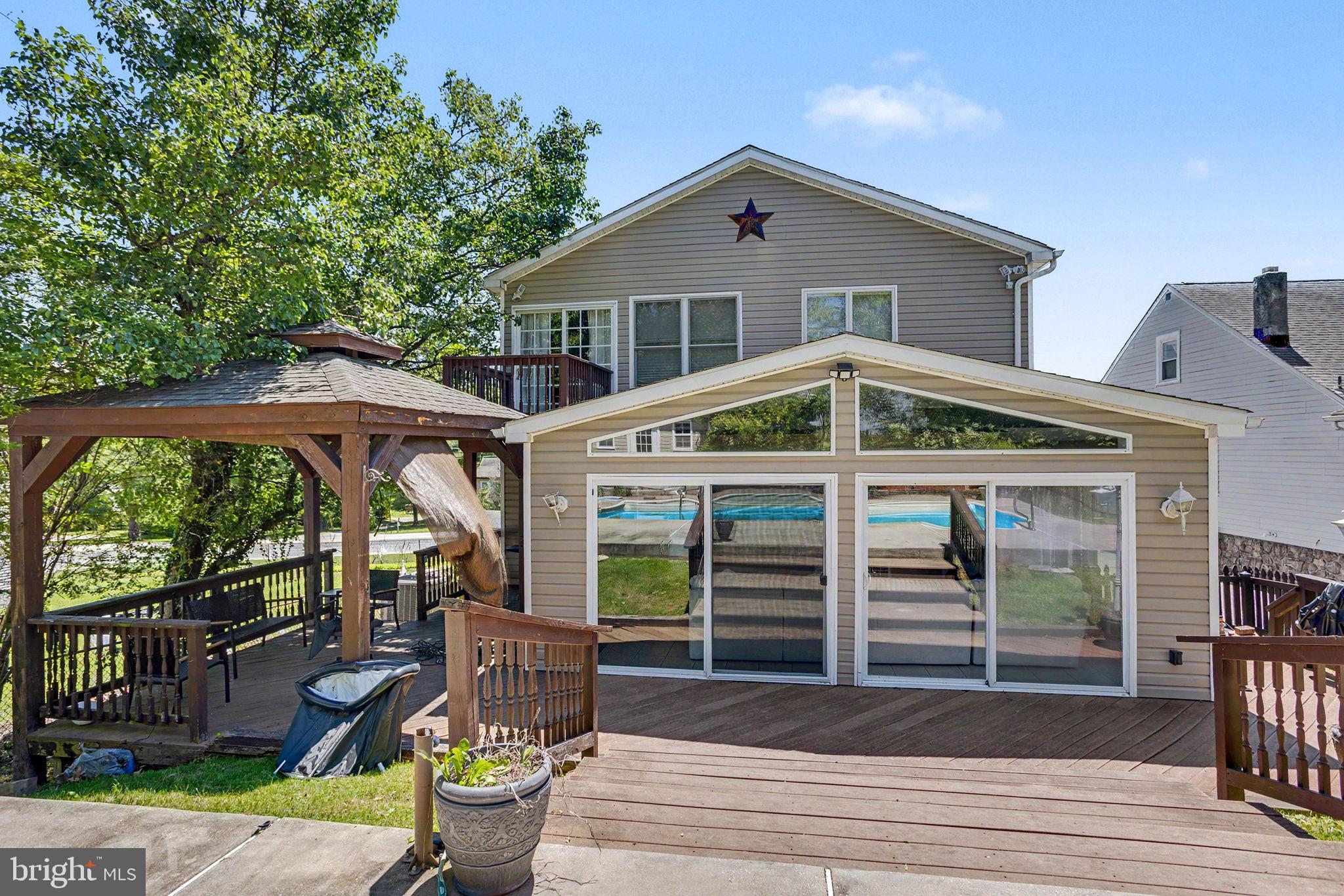 This beautiful Cape Cod features a spacious living area with welcoming gas fireplace, kitchen with granite counter tops, and a bright & airy sun room overlooking the backyard with an in-ground pool.  The main level also features 2 bedrooms and a full bath, while the upstairs boasts an open concept owners suite with a full bath and balcony overlooking the backyard.  The 4th bedroom on the second level is currently being used as a walk in closet.  The basement is finished and perfect for a family room or entertainment area.  Don't miss this one!