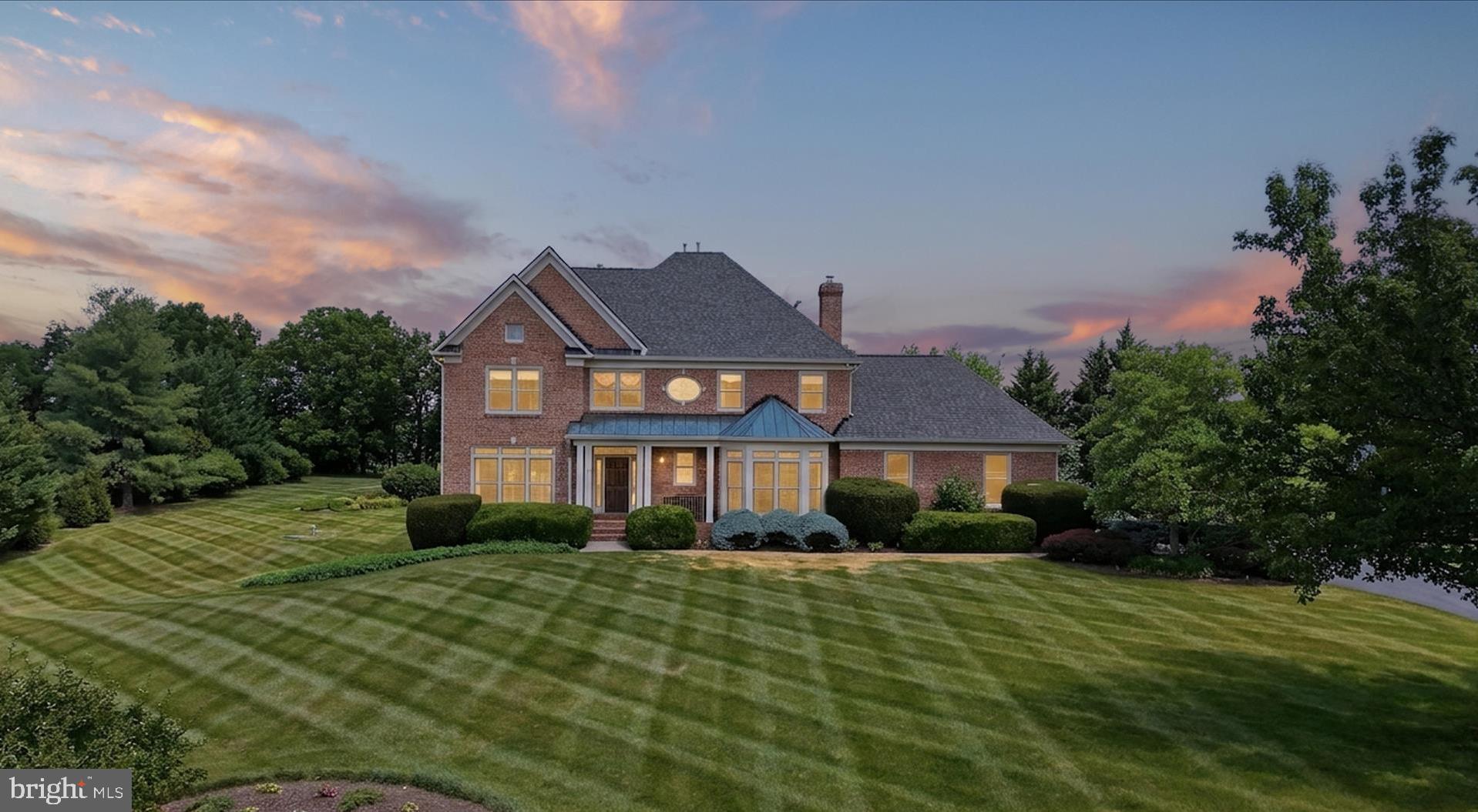 Exceptional Custom Home with Panoramic Mountain & Pastoral Views in Butler Estates.

Nestled in a scenic valley on a private 2-acre cul-de-sac lot in the prestigious Butler Estates subdivision, this stunning 4-bedroom, 4.5-bath residence offers over three finished levels of thoughtfully designed living space, exceptional craftsmanship, and breathtaking Appalachian Mountain & pastural views.

From the moment you enter, you'll appreciate the elegant details that define this home, including extensive crown molding, rich hardwood flooring throughout the main level, and beautifully appointed formal living and dining rooms designed for both everyday living and entertaining.

The gourmet kitchen is a chef's dream, featuring granite countertops, a center island, propane cooktop, and reverse osmosis water filtration serving both the kitchen sink and refrigerator. The adjoining family room creates a warm and inviting gathering space with custom built-ins and a brick gas fireplace.

A dedicated home office with custom built-ins, hardwood floors, and crown molding provides the perfect setting for working from home.

Upstairs, the luxurious primary suite serves as a private retreat, complete with a tray ceiling, two walk-in closets, and a private balcony overlooking the spectacular scenery. The spa-inspired primary bath features double vanities, a jetted soaking tub, and a beautifully tiled walk-in shower. Three additional bedrooms offer comfortable accommodations, including one with a private ensuite bath and two connected by a Jack-and-Jill bath with double vanities.

The finished walkout lower level is designed for relaxation and entertainment, featuring a spacious recreation room with a gas fireplace, a media room with built-ins, wet bar, and electric fireplace. Plus all media equipment and television convey, making this space truly move-in ready. An exercise room and an additional room suitable for an additional bedroom, and a full bath with walk-in shower complete the lower level.

Outdoor living is equally impressive with a low-maintenance TimberTech deck, two brick patios, professionally landscaped grounds, invisible fencing, and unmatched mountain and pastoral views that can be enjoyed year-round. All this plus a brand new roof!

This exceptional Butler Estates home offers  a rare blend of natural beauty, privacy and timeless charm. Schedule your private tour today and experience the beauty, quality, and views that make this property truly extraordinary.