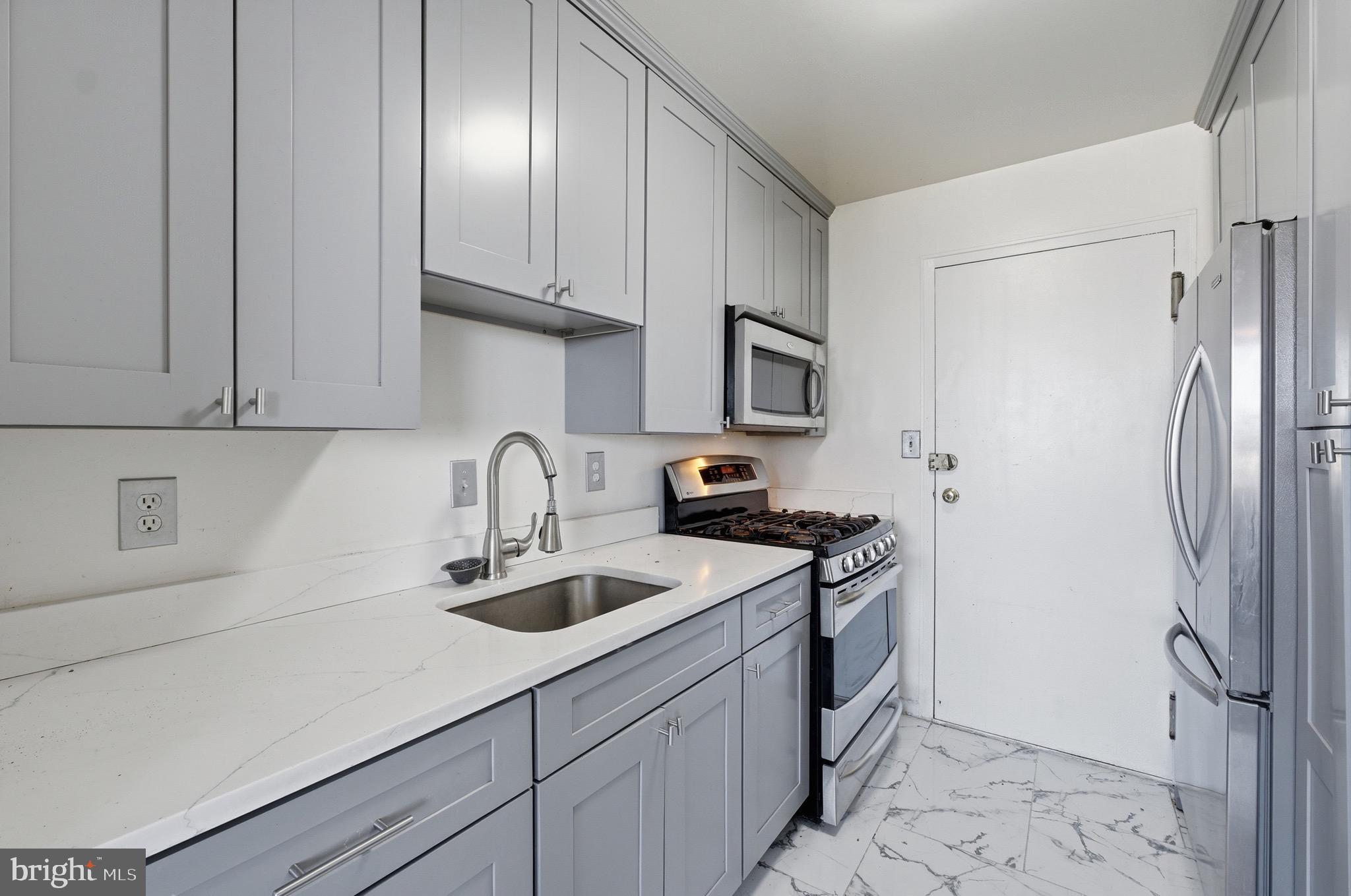 Welcome to the Seville. This 2 bedroom 1 bathroom condo needs some cosmetic TLC, but is priced to sell and ready for a new owner who is willing to give it the love it needs. Kitchen is recently updated! Located in a secure mid-rise building with a dedicated front desk attendant, residents enjoy exclusive access to amenities including a community pool, a gym, BBQ area for outdoor dining, and a versatile party room. Nearby, explore all of the shopping options, cultural hubs, and dining experiences, all just moments away. With easy access to Maryland University campus, Hyattsville Crossing Metro, and seamless commuting to Washington, D.C., this residence epitomizes both comfort and convenience in one of Maryland's most desirable locations. Schedule your showing today! (Be sure to park in visitor space or street otherwise you could be towed)