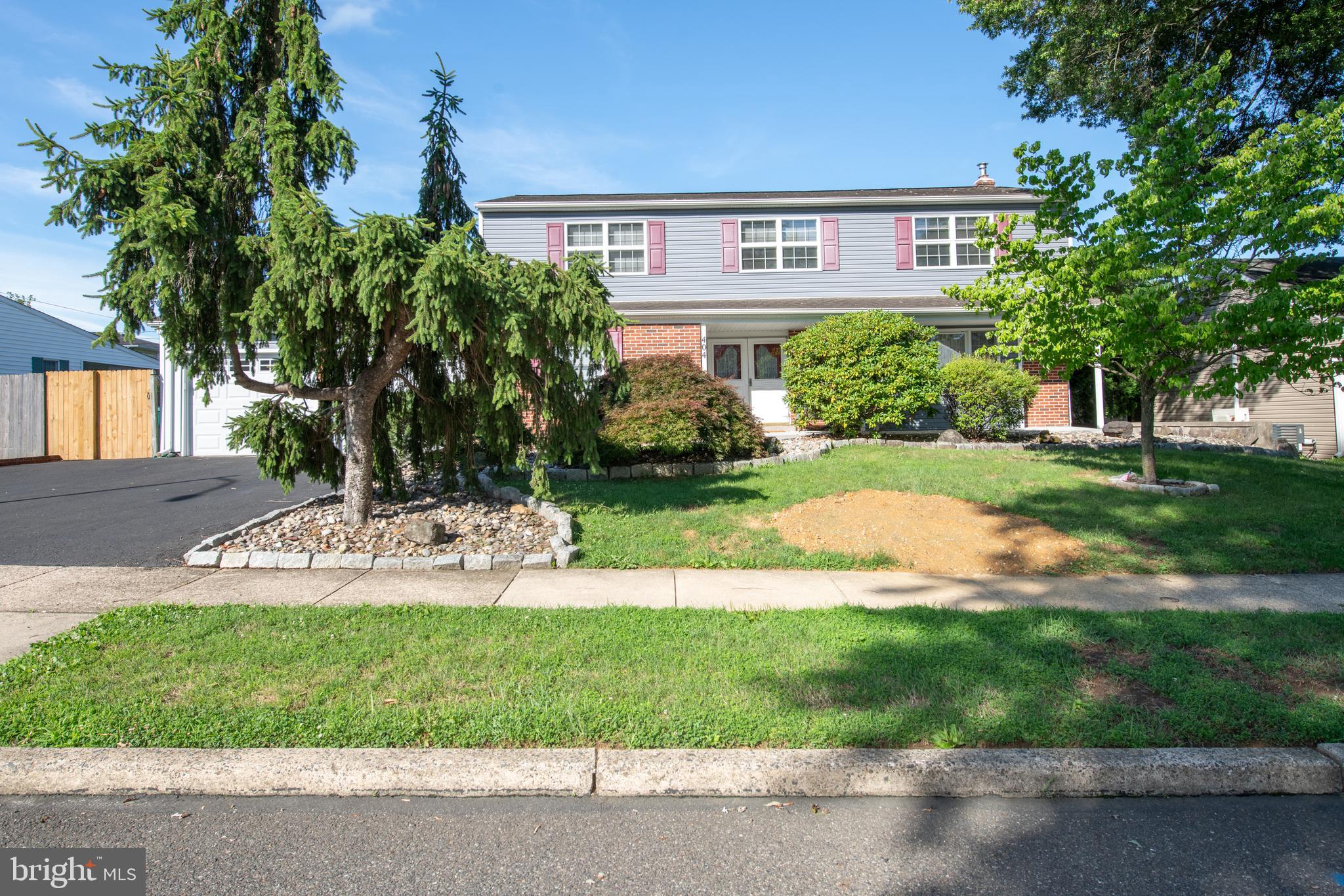Need more space? This beautiful Fairless Hills family home with great curb appeal has been refreshed & is ready for its new owner!  This classic brick Colonial features a double driveway, welcoming walkway to a covered front porch, and a two-car garage.
Step through the double doors into a slate-floored foyer. To the right, you’ll find a spacious living room with hardwood floors and a large picture window that fills the space with natural light. The expanded dining room is truly a standout—generously sized and perfect for hosting gatherings, with hardwood flooring, chair rail molding, and three windows.
The expanded kitchen offers ample space for cooking and entertaining. It features laminate flooring, a double sink with a window & a garden window, direct access to the screened porch.
The family room showcases exposed beams, a ceiling fan, fireplace, hardwood floors, and crown molding. Just off the family room is a convenient in-home office—ideal for remote work, study or bonus/kid craft room.  
A functional laundry room includes a utility sink, double closet, powder room, and access to both the garage and screened porch. Two car garage with loft for additional storage.
Enjoy outdoor living in the large screened porch, complete with a built-in cooking area ready for your grill of choice. The backyard is perfect for summer fun, featuring an in-ground pool, side yard & patio area.  , 
Upstairs, the spacious primary bedroom offers hardwood floors, a ceiling fan, three windows, double closets, a vanity area, and additional storage including a linen closet. The en-suite bath includes a walk-in shower.
BR2 features hardwood floors, a walk-in closet, 2  windows, chair rail, and ceiling fan.  Br 3 has 2 windows, a ceiling fan, and double closet  BR 4 with ceiling fan, double window, and closet.  A hall bathroom serves the additional bedrooms.
Partially finished basement with storage area, closets, built-in benches, crawl space & 2 new sump pumps.  A Generac generator is also included!
Lovingly maintained by the same family for over 30 years, you can now make this home your own.  The seller has completed the Falls Township U&O and has all 4 certificates.  The property & pool are being sold as is.  
Pennsbury Schools & close to shopping!  Move in just in time for the school season and upcoming holidays—don’t miss this opportunity!