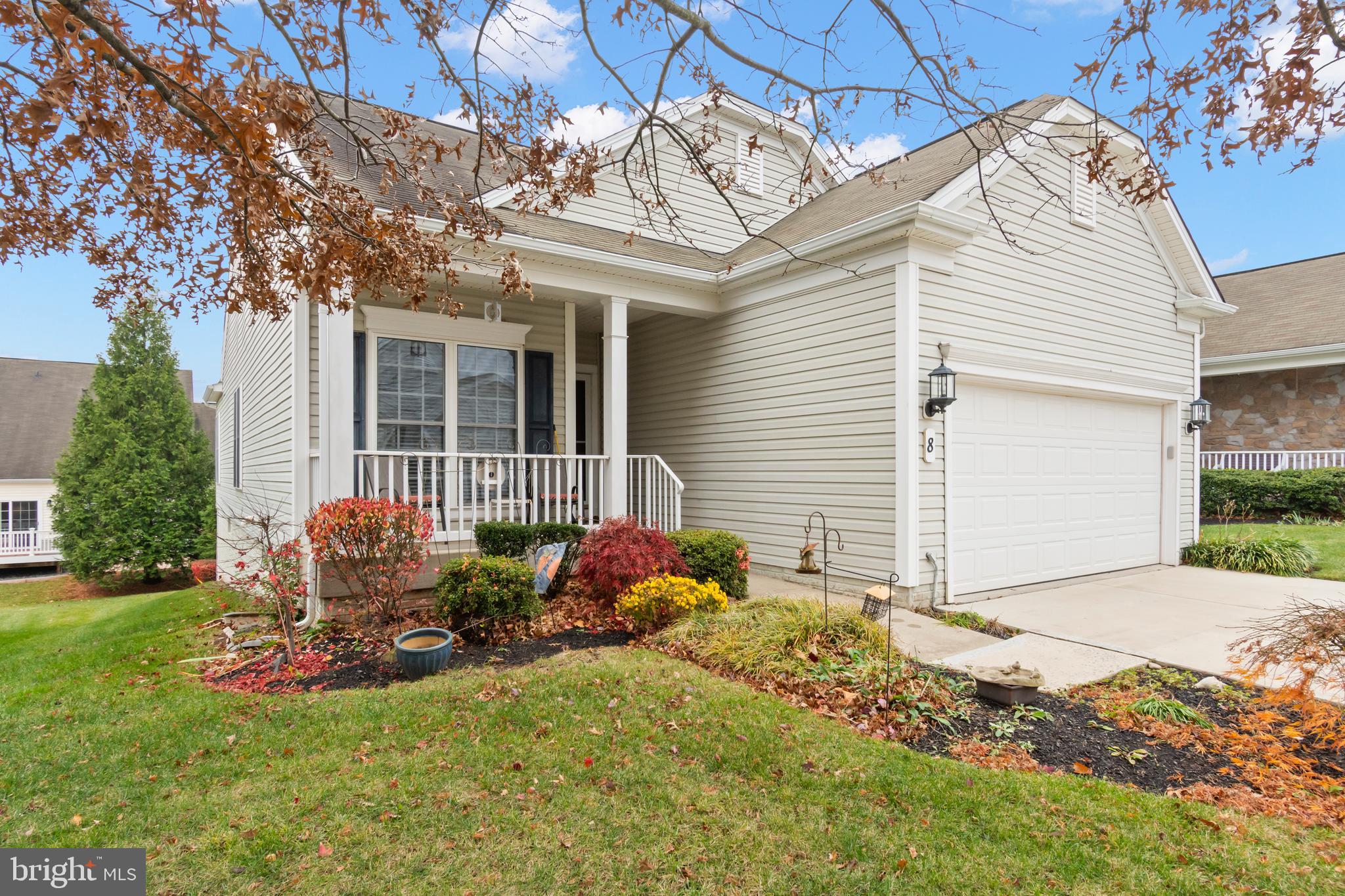 Welcome to this rarely offered extended James model, freshly painted and updated throughout with brand-new LVP flooring. This beautiful 3-bedroom, 3-bath home features a full walk-out basement that includes a spacious great room, a private bedroom ensuite, a hobby/craft room, and a generous storage area. The main-level great room is a standout, enhanced by a cozy gas fireplace with custom moldings, recessed lighting, and a wall of windows that fill the space with abundant natural light. The eat-in kitchen offers ample room for a table and overlooks the charming front porch—perfect for enjoying your morning coffee. The primary ensuite features large windows, a full bath, and a spacious walk-in closet. The second bedroom, conveniently located near the second full bath, offers a comfortable and private area for guests. The main-level laundry room includes a utility tub and provides easy access to the two-car garage. With plenty of amenities, here’s your chance to be part of a never-ending vacation. Residents enjoy a vibrant lifestyle filled with activities, social events, and beautifully maintained grounds. Whether you’re looking to unwind by the pool, join a fitness class, play a round of pickleball, or gather with friends in the clubhouse, there’s always something to do. Scenic walking trails and inviting common spaces provide countless opportunities to relax, explore, and connect. This is a place where every day feels a little brighter, a little easier, and a lot more fun—truly resort-style living right at home.