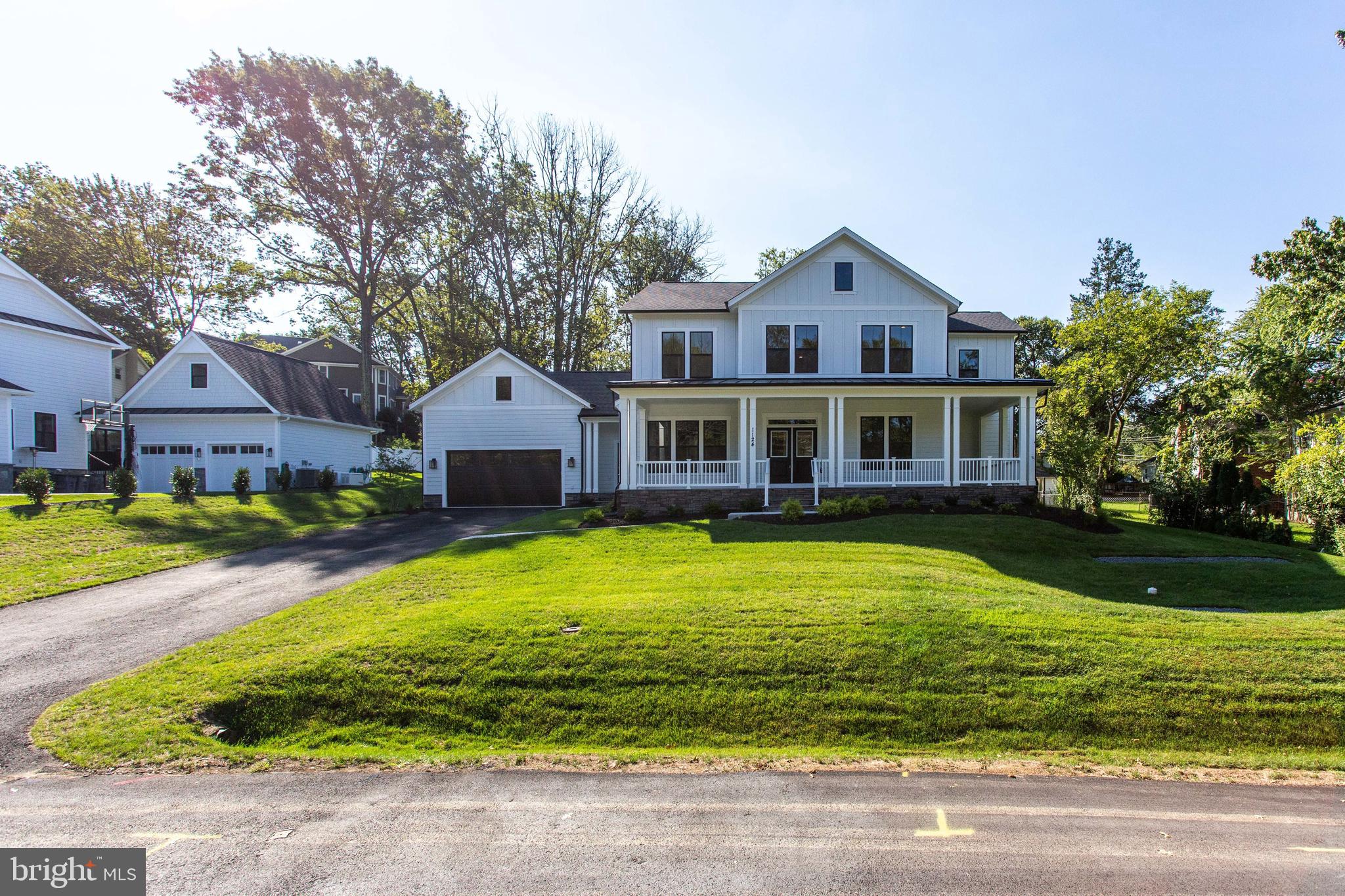 .OFF SITE OPEN HOUSE SUN  12-4 Arbors of McLean  1924 Westmoreland St McLean

Newly finished beautiful construction, perfect time to visit the Millwright model by Evergreene Homes! Highly sought after Country Farmhouse Designed Luxury home that is 82 feet wide on a beautiful half acre lot within 1 mile of Tysons Corner.  Wonderful Wraparound Porch, Black Front Windows, Door, and Downspouts with 6 Bedrooms and 6.5Baths.  The Main Level features include 10' Ceilings, Custom Kitchen with Wolf Cooktop and 64-inch Wide Side-by-Side Refrigerator/Freezer, Private first floor In-Law Suite with separate Outside Entrance, Oversized Windows in the Kitchen and Family Room overlooking Park-like Rear Yard with Deck.  Upstairs, you'll enjoy 4 Bedrooms with 4 Baths and an Open Loft area.  The Master Bedroom comes with hardwood floors and a Tray Ceiling.  The Master Bath is appointed with a  Free-Standing Tub, Over-sized Deluxe shower with Glass Doors, multiple Shower Heads and Quartz Countertops.  The Lower Level includes a Large Recreation Room, Exercise Room, Bedroom with Full Bath, and a Storage area. Custom appliances delivered shortly. *****Temp Fridge in photos, with missing hood vent cover.