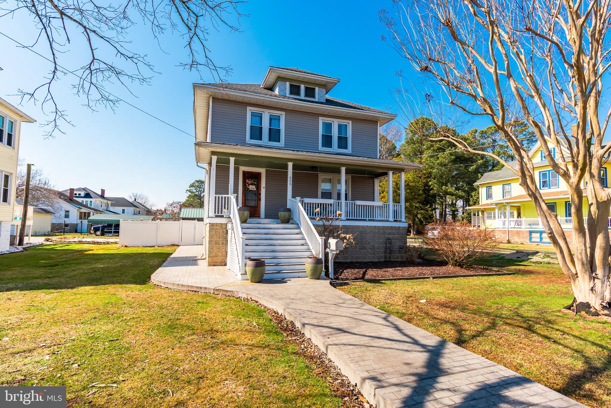 A real gem of a home, located in quiet, scenic Crisfield. Classic Four Square Craftsman, this home has beautifully refinished original hardwood floors, large living room with corner propane fireplace, large dining room, a gorgeous stairway with classic Craftsman detail, and a totally renovated serious cook's kitchen, butler's pantry, bathroom and utility/mudroom.  Kitchen has hardwood flooring,, floor to ceiling tile, walnut Boos counters, a six burner professional range/oven, stainless refrigerator, Bosch dishwasher and a pot filler.  Off the kitchen is a butler's pantry with another refrigerator, coffee bar and storage, and a totally renovated tiled bathroom with a jetted tub.  A small mudroom holds the stack washer and dryer.  The second floor has four bedrooms, with beautifully refinished pine flooring, a renovated bathroom with a walk in tiled shower, and features a marble sink top.  There is a full floored attic for additional storage.  The roof is less than 5  years old , there are replacement windows, two zone central air and heat and a  walk in dry basement.   A large screened pavilion with a stamped concrete floor and metal roof is the place to be in the summer for grilling and summer parties.  Detached metal sided and roofed garage is 24'x20' with work benches and room for a vehicle.  Garden area with maintenance free stoned surface and raised beds for summer vegetables.  Fig bush, raspberries and blackberries are a bonus! Completely fenced in rear yard for privacy.  If you love all the features of an older home, the details, the craftsmanship, but not the worry about maintenance, this home is for you.  So many features make this home an outstanding value!
Interior photos coming soon.
