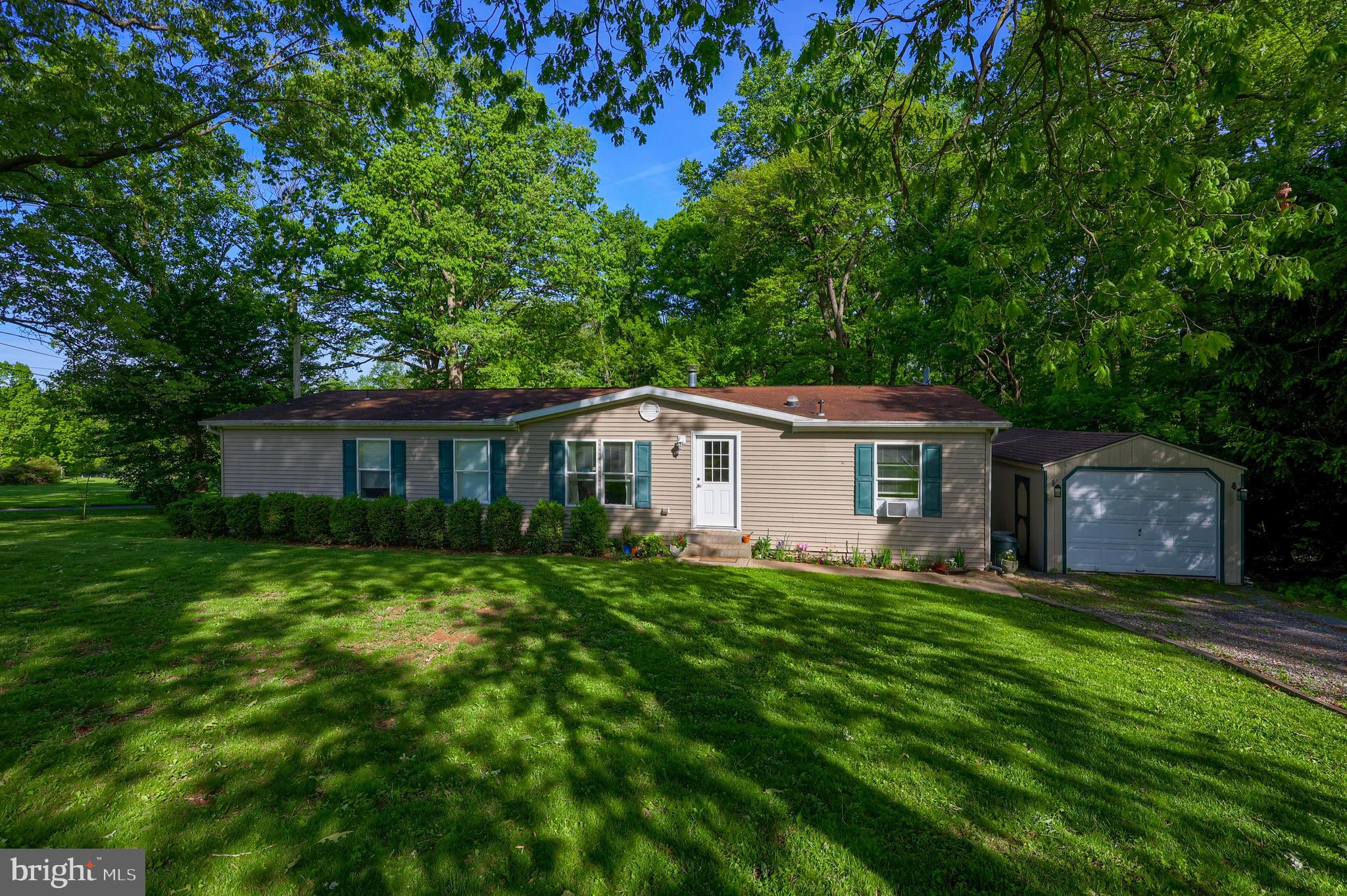 If you are a nature lover and looking to get away from the hustle and bustle while still being in close proximity to town this is the home for you! Situated on slightly under 1 acre of land this home has plenty of space both inside and outside. The oversized living room has a beautiful wood burning fireplace to enjoy in the colder months. The kitchen cabinets were newly refaced in a beautiful soft white giving the kitchen a fresh new and updated look! The master bedroom has a walk-in closet and on-suite bath with large soaking tub. Outside the home are many mature trees giving you much needed shade as the temperatures heat up! Enjoy your morning coffee on the enormous, covered deck while you watch the wildlife. Or invite company over to show off your charcoal skills and take advantage of your spacious and private back yard. A home like this one on such a beautiful property is hard to find, so act fast!!