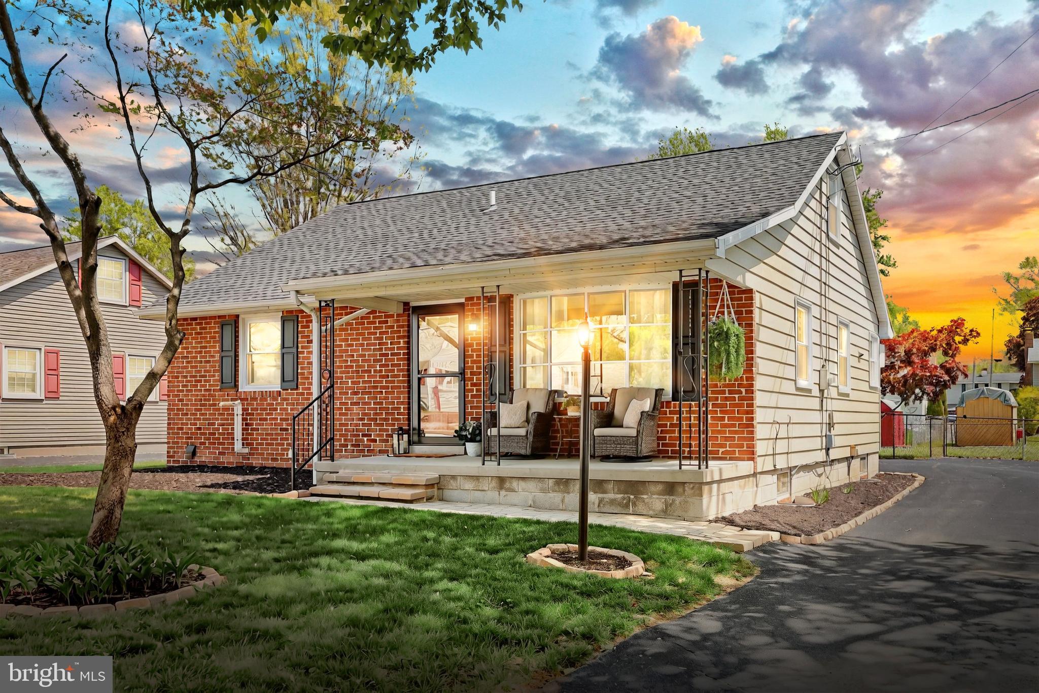 This beautifully maintained brick Cape Cod offers the perfect blend of classic charm and modern updates. Featuring two bedrooms and a full bath on each floor, this flexible layout suits a variety of living needs. Relax on the inviting front porch or enjoy the fully fenced backyard—ideal for outdoor entertaining or peaceful retreat. The kitchen has been thoughtfully renovated with crisp white cabinetry, a stylish backsplash, under-cabinet lighting, and a functional island with marble top—perfect for meal prep and casual dining. Convenient access to the attached garage through the kitchen adds ease to your daily routine.  Enjoy the durability and style of maintenance-free vinyl plank flooring in both the kitchen and living room. Numerous updates provide peace of mind, including double-hung windows, a newer roof, and central air conditioning.  Truly move-in ready, this 4-bedroom, 2-bath home is waiting for you to make it your own!