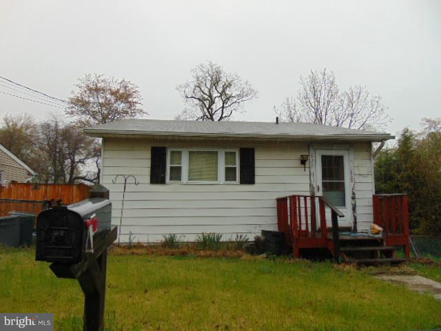 "Little treasure!" Great home with simple living all on 1 level on a quiet street nestled away, but still close to everything. The home offers fresh paint, a decent living room, and  deck in the back. The lower level basement offers lots of potential. There are very few single family homes in this price range so come take a look and bring your best offer! Sold strictly as is, where is.