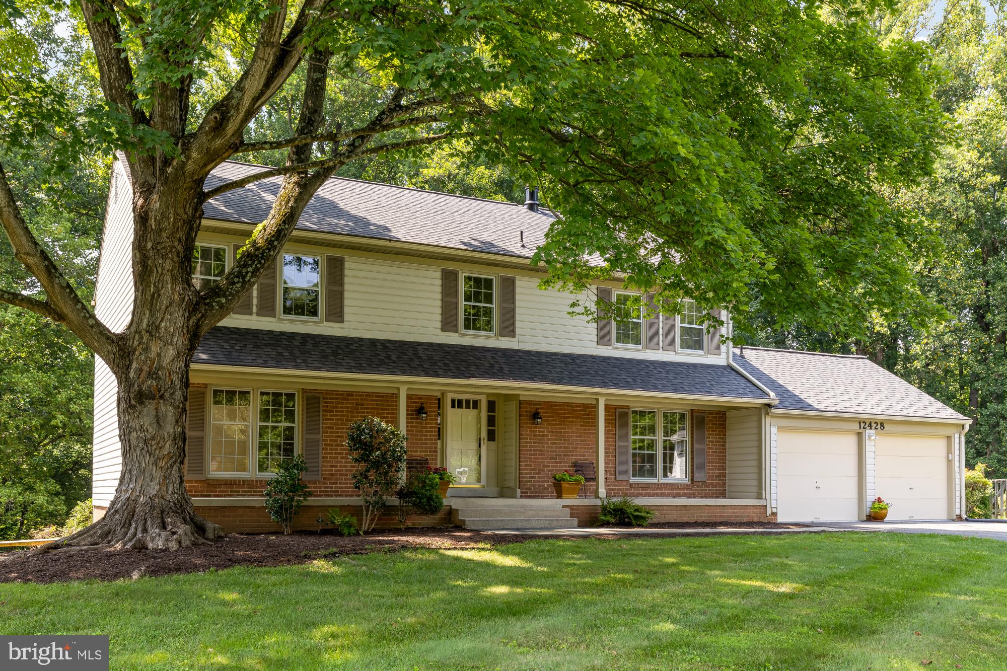 Welcome to this updated center hall colonial located on a double cul-de-sac with a gorgeous, wooded view!  Enter this home to a gracious two-story foyer and an oversized living room to your left and a beautifully updated powder room on your right.  This home has been freshly painted and has brand-new engineered hardwood flooring throughout.  The living room leads to a sun-drenched dining room with updated lighting. The table-space kitchen has been outfitted with new stainless-steel appliances, and the adjacent sliding glass door leads to a brand-new deck overlooking the wooded view of the back yard.  Step down to the family room featuring a wood-burning stove.  A fifth bedroom, which doubles as an office, rounds out the first floor.  The upper level boasts four oversized bedrooms, three walk-in closets and brand-new carpet in three of the bedrooms.  Enter the double doors into the primary bedroom featuring two large closets and a primary bathroom with double sinks and a shower.  The sun-filled lower level features recessed lighting and a sliding glass door which leads to a slate patio and a large, fenced rear yard. The lower level also features the third full bath, and tons of storage. This home feeds into Cold Spring ES, Cabin John MS and Wooton HS.