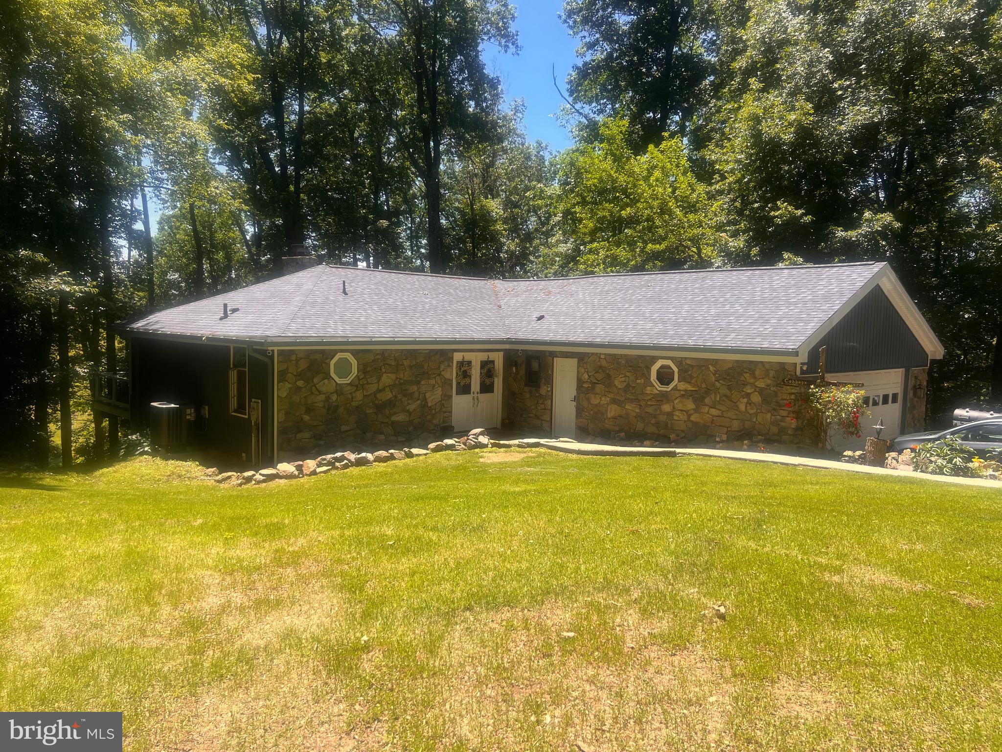 Rare opportunity to own an exceptional 25-acre retreat in scenic Woodsboro, Maryland. This picturesque property offers the perfect blend of open fields and mature woodland, creating a private and peaceful setting. At the heart of the property is a beautiful pond, providing stunning water views from both residences. The main home features 3 bedrooms and 2 full and one half baths and is highlighted by a spacious deck overlooking the pond—an ideal spot for entertaining, relaxing, and enjoying the surrounding natural beauty. A separate guest house also enjoys pond views, offering excellent accommodations for extended family, guests, multi-generational living, or potential rental opportunities. This unique property provides a rare combination of acreage, water features, and two residences in a beautiful Frederick County setting. Enjoy the tranquility of country living while remaining conveniently located near commuter routes, shopping, dining, and local amenities.