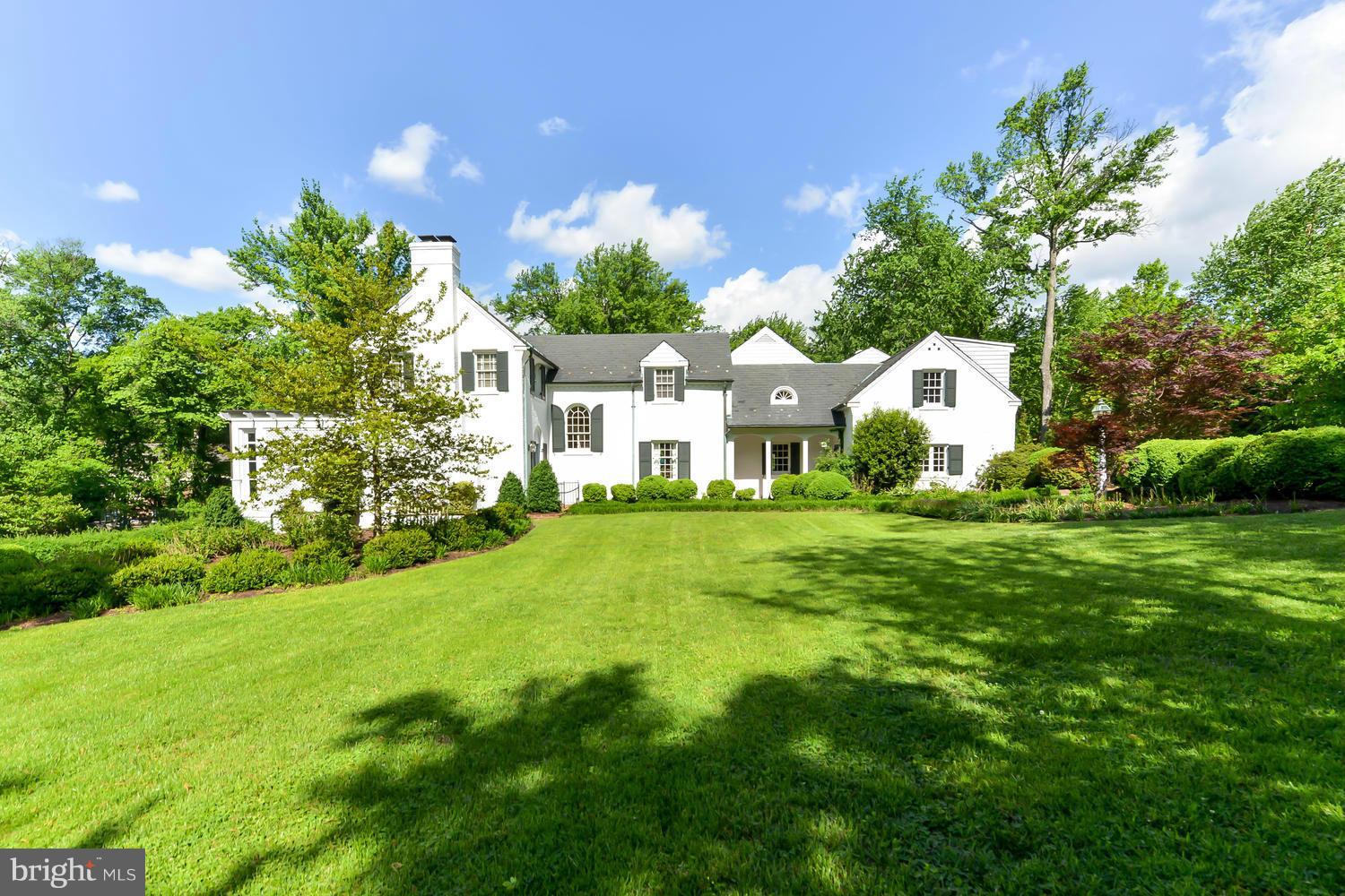One of a  kind!  Timeless, New England style home, situated on a beautiful 2+ acre lot. Blending old house charm with     top quality updates, this home offers gracious living and room to expand!  Detached 2 car garage with fully outfitted in-law apartment above, ideal for home office, studio or live-in staff.  Tennis Court and extra easy access to DC, Pentagon and points beyond. A must to see.
