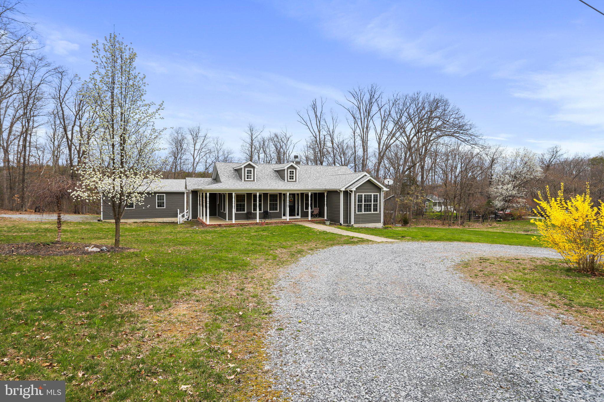 This beautiful and spacious rancher has so much to offer! The home features  4 large bedrooms and 3 full bathrooms, a fully finished walk- basement for total of 3350 finished sq. ft. and a large 2.4 acre yard.  Bright and open  living area offers cathedral ceilings, lots of windows and a wood burning stone fireplace for those chilly nights. Large country kitchen has a cozy breakfast nook and large pantry for extra storage. Main level Primary Bedroom has an updated full bathroom, large walk in closet and a covered private balcony. There is also a second bedroom, 2nd full bath and laundry on the main level. The fully Finished basement offers 2 more spacious bedrooms, and another full bath. Need a home office, a craft room, or maybe a workout room? With 3 bonus rooms, you can have them all!  There is also a large rec room/family room area with a pellet stove. Plenty of room to enjoy the outdoors, relax on your large covered porch, or on your spacious back deck, even swim in your own private pool! has gated access to There is a large 2 car detached garage and a brand new shed for storage. Walking distance to Opequon Creek access. Many recent updates include a new cook top, microwave, dishwasher, well pump and ejector pump, water heater tank, updated bathrooms and house has been freshly painted. Move in ready and just waiting for it's new owner.