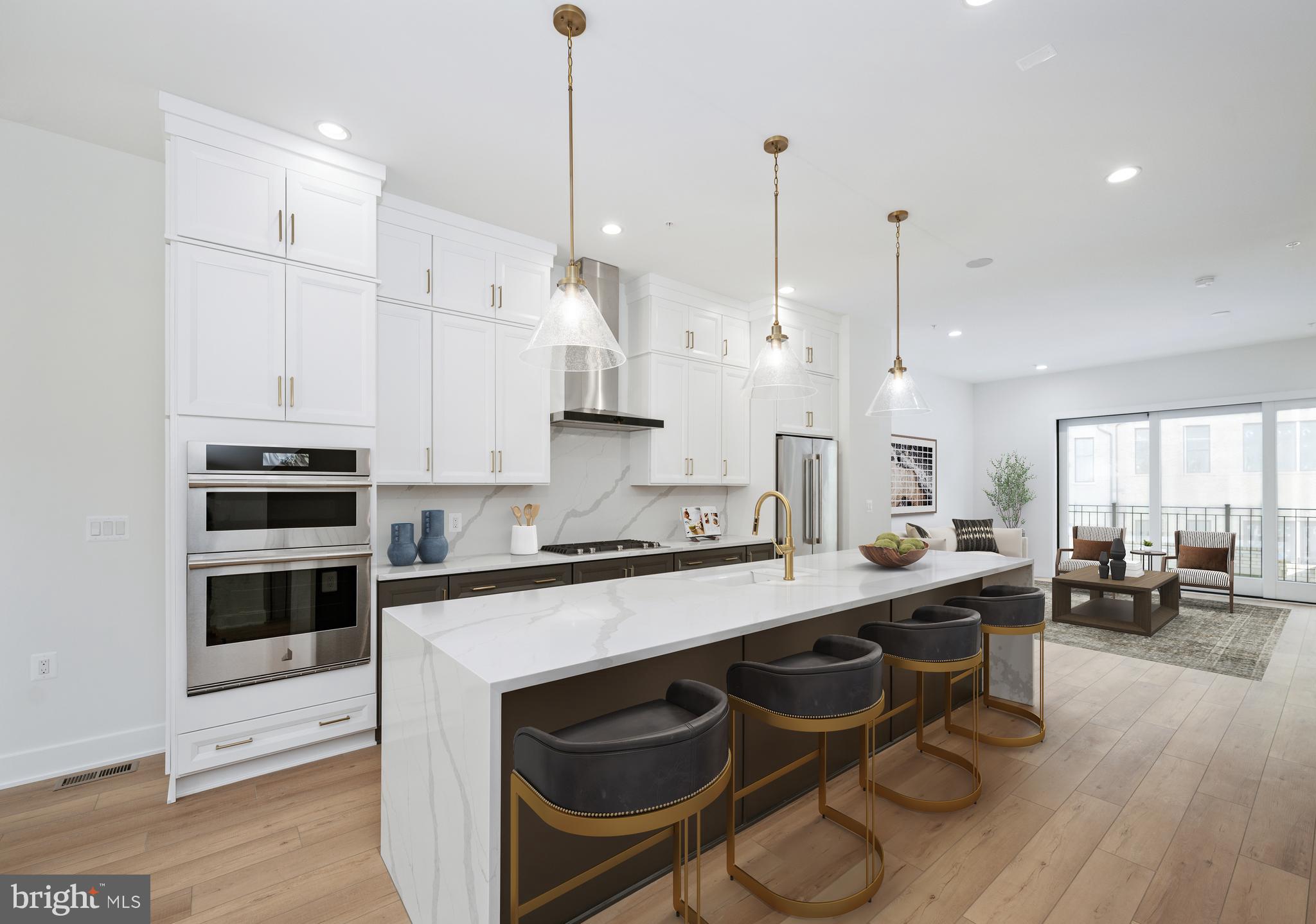 This elevator-equipped luxury townhome is truly stunning, thoughtfully designed with high-end touches throughout. The entry-level features a versatile bedroom - perfect as a guest suite, home office, or private retreat. On the second floor, you'll find a spacious, open-concept layout that seamlessly connects a chef-inspired kitchen, generous dining area, and an expansive great room—ideal for entertaining. A walk-in pantry and access to a covered deck complete the kitchen space, combining function and style. Upstairs, the third level offers two expansive primary suites, each with ample closet space and elegant ensuite baths, providing comfort and privacy. Take your private elevator all the way to the rooftop terrace, a true showstopper, featuring a retractable awning and cozy fireplace—perfect for year-round relaxation or hosting under the stars. Best of all, our design team has carefully hand-selected every finish, fixture, and material to reflect a sense of effortless luxury. From rich textures to refined color palettes, each choice is made to elevate the space and create a warm, sophisticated atmosphere that feels both timeless and uniquely personal. All this, just minutes from the premier shopping, dining, and vibrant energy of Chevy Chase, Friendship Heights, and Washington, D.C.