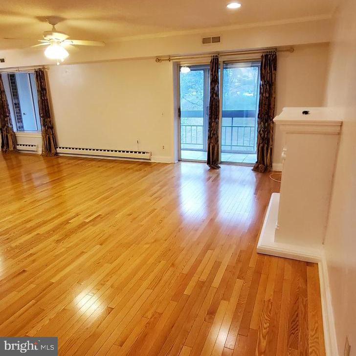 3 BR, 2 BA apartment in Leisure World, a 55+ community that lives like a resort! This home offers over 1400 square feet of living space and boasts hardwood floors, reserved carport parking, a relaxing balcony plus a spectacular renovated kitchen with gorgeous cabinetry, under-cabinet lighting, upgraded appliances and tons of storage! All utilities are included in the monthly rent, including basic cable TV and high-speed internet! Community amenities include 3 restaurants, indoor and outdoor pools, amazing fitness center, an art studio, library, MedStar Health Center, golf course, pickleball courts, 24-hour security and so much more! Call for your tour today! The owner prefers a 2-year or more lease.