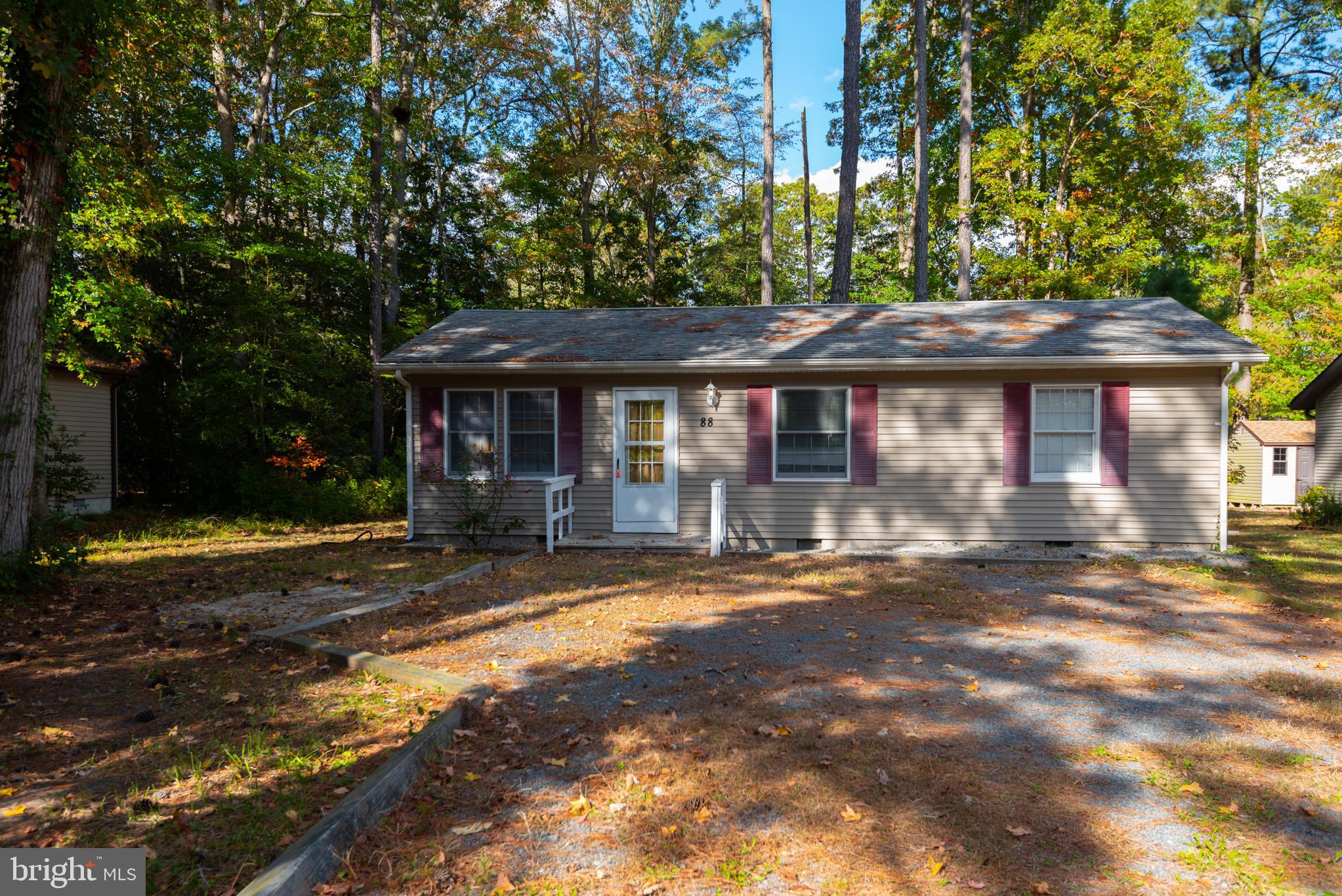 Welcome home to this cozy and affordable 3-bedroom ranch in the amenity-rich community of Ocean Pines! This charming single-level home offers a fresh feel with new carpet and some areas of fresh paint. Inside, you’ll find a cheerful living room, an open kitchen, and a combined  dining area that opens through sliding glass doors to a semi-private backyard—perfect for enjoying quiet mornings or casual outdoor activities. The home’s efficient layout make it ideal as a starter home, coastal retreat, or investment property. Recent updates include a new carpeting in 2025, HVAC in 23/24, new water heater in 2025, and the roof is only 8 years young. Crawl space polybutylene plumbing was replaced in 2025 and replaced with CPVC. A new water main was also installed in 2025 along with a new sump pump. So many of the big-ticket items have already been taken care of! The spacious yard and generous driveway offer plenty of room for parking, outdoor enjoyment, or even future extended landscaping projects. Enjoy all that Ocean Pines has to offer, including multiple pools, marinas, golf, racquet sports, playgrounds, a community center, and even a private Beach Club in Ocean City. With low HOA fees and endless amenities, this home combines comfort, affordability, and opportunity in one of the Eastern Shore’s most desirable communities. Whether you’re ready to stop renting, looking for a relaxing getaway, or searching for an easy-to-manage investment, this home is a smart move. Come see how good life can be in Ocean Pines—schedule your showing today!