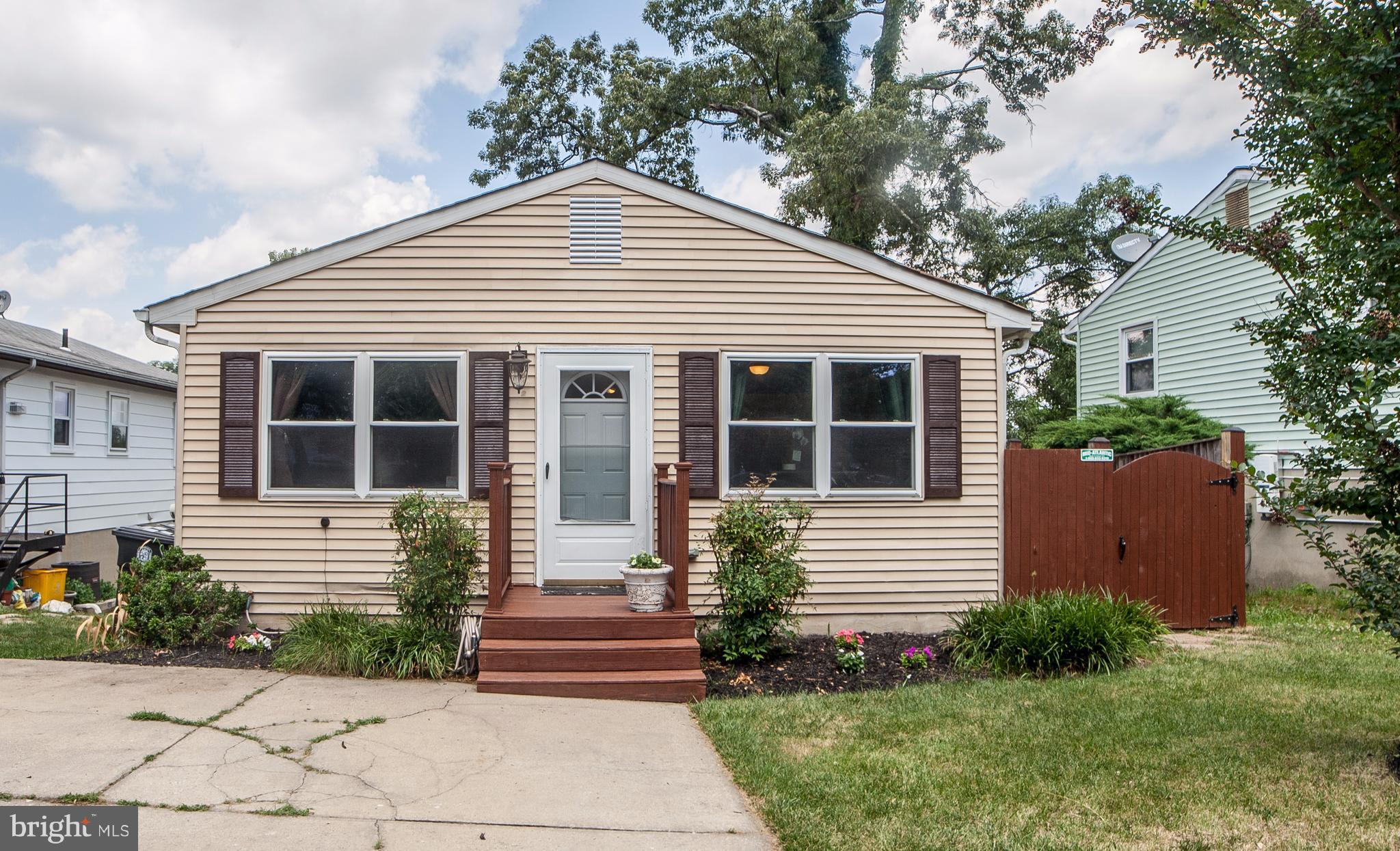 This well loved home is full of charm. The entire main level is flooring, sunlight filled eat-in kitchen, trek deck off the kitchen that leads to the backyard...imagine entertaining family and friends on warm summer days in the privacy of your own backyard. Great location.