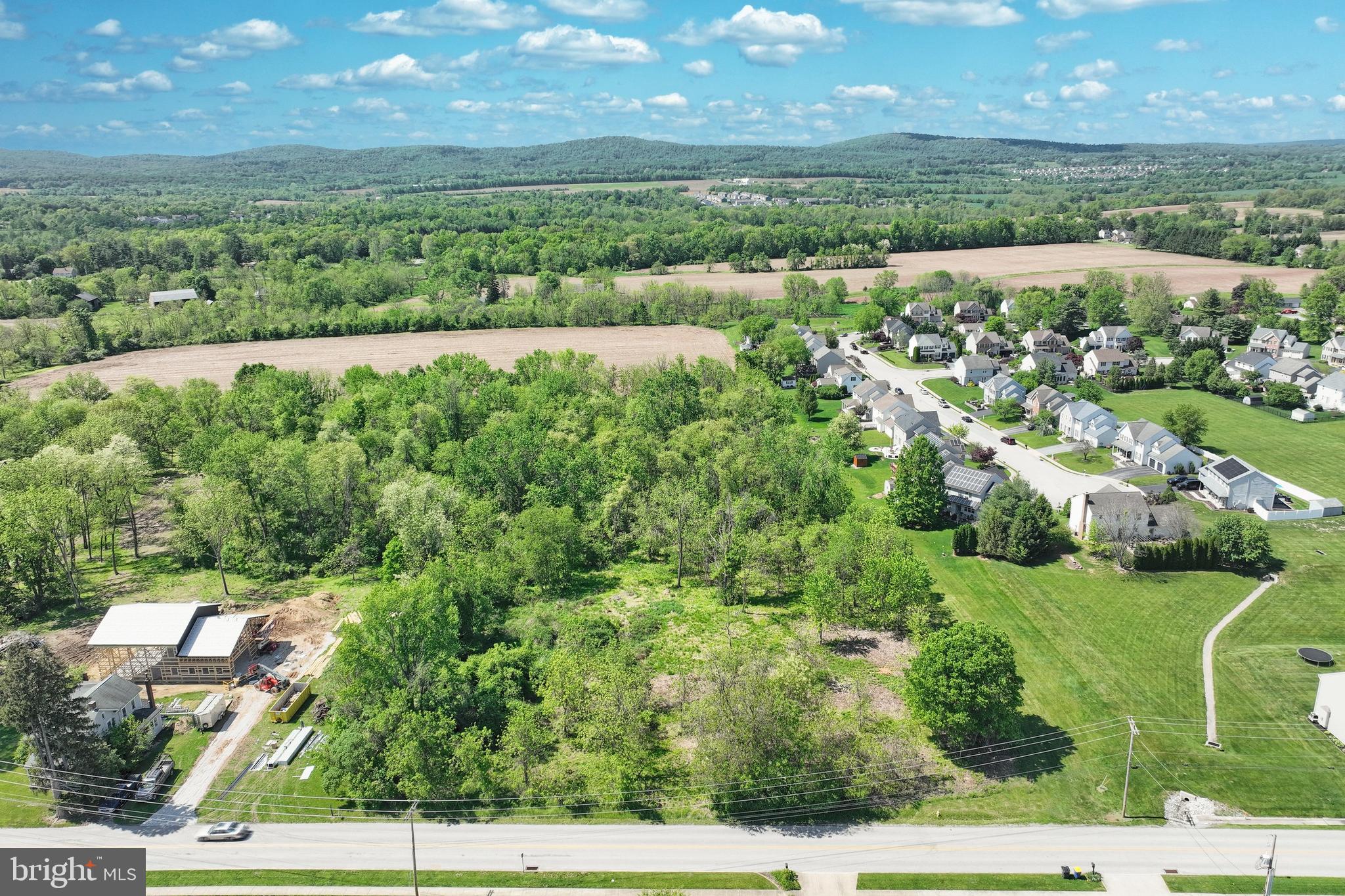 Bring your own builder or work with our trusted builder to create the custom home of your dreams on this rare 1.30-acre level lot. Flat, buildable land like this is hard to come by in the sought-after Central York School District.

Nestled in a peaceful and private setting, this lot offers the perfect retreat while still being conveniently close to Route 30 and I-83, providing easy access to Lancaster, York, and Harrisburg. You'll also enjoy close proximity to shopping, dining, parks, and walkable neighborhoods.

Raintree Road offers a tranquil environment for your future oasis, with public water and sewer available for hookup — making the building process even smoother.

Don’t miss this unique opportunity to secure a beautiful piece of land in an ideal location!