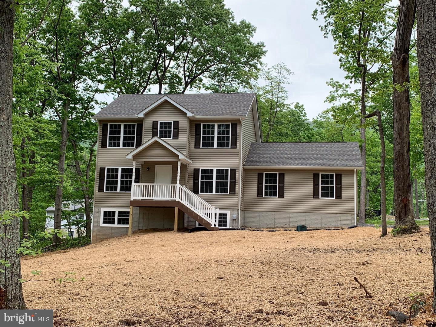 6-2-26 Foundation going in.

Current Shawneeland Inventory
107 Pinto Trail (split foyer)
208 Beaver Trail (split foyer)
210 Beaver Trail (split foyer
212 Falcon Trail (colonial)
211 Inca Trail (colonial)
103 Tonto Trail (split foyer)
Premium Finishes: Enjoy a builder-upgraded interior featuring gleaming hardwood floors throughout the entire home (including all bedrooms) and elegant tile in all bathrooms.
Gourmet Kitchen: Equipped with upgraded cabinetry, sleek granite countertops, a central island, and a sunny breakfast nook.
Modern Layout: An airy, open floor plan connects the family room to a formal separate dining room.
Owner’s Retreat: The spacious primary suite boasts two walk-in closets and a "true" master bath with a soaker tub and separate shower.
Expansion Potential: The full basement is ready for finishing with a rough-in for a future bath and a pre-installed radon mitigation pipe.
Xfinity available.