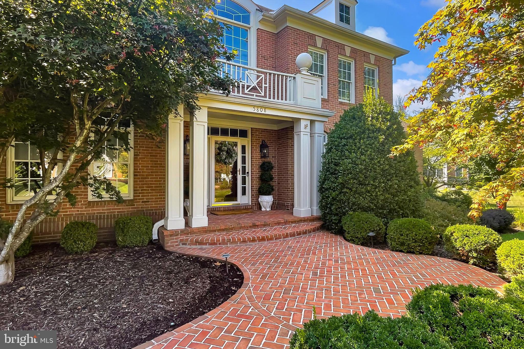Price Improvement!  This is a home that you have to see for yourself - it's even better than the photos!  This immaculate estate home, built by Stanley Martin, is tucked in the prestigious section of the Virginia Run community called The Ridings.  This home boasts almost 7,000 square feet on four finished levels, a three car side load garage,  a .83 acre level lot with mature landscaping, an expansive patio and a fully fenced backyard.  Some recent updates include:  2 HVAC systems, carpet on the bedroom and upper loft levels, cordless window shades, GE Cafe refrigerator, LG washer/dryer, alarm system, custom built-in entertainment center in the family room, wallpaper in the dining room and powder room and a Tesla charging dock in the garage.  The main level of this home is primarily hardwood flooring with a two story family room, extensive moldings and a wonderful, open floor plan.  Each room flows seamlessly to create a cohesive space, perfect for entertaining and everyday life.  Glorious windows throughout flood the home with light.  The front part of the home features an oversized formal dining space with William Morris wallpaper, a formal living room and a bonus sunroom with a wet  bar.  The gourmet kitchen toward the back of the home has an eat in area, a center island with bar seating, Corian countertops, gorgeous natural cherry cabinetry and double wall ovens.  The laundry room, off the kitchen, has a convenient utility sink.  The bright morning room with a semi-circle of floor-to-ceiling windows has a wonderful view of the backyard.  Completing the main level is a large, private office which could be used as a bedroom, and a powder room.  Up the grand butterfly staircase, the expansive primary suite features a sitting area, a closet that you just have to see to believe and a relaxing spa bathroom with a serene soaking tub and separate shower.  The upstairs also features three additional spacious bedrooms with generous closets.  One bedroom has an en-suite full bathroom and the other two share a jack and jill bathroom.  Continue up one more level to a loft area that can be used as a den, flex space, office or additional family room.  The lower level of the home features a large recreation space with plush carpet, a full wet bar with granite counters and stainless steel appliances, a flex space with an attached bathroom, a workout room and plenty of unfinished storage space.   You will enjoy the outdoors of this home as much as the inside with a private paver patio and a fully fenced backyard with room for a pool and playground.  All of this is situated in the wonderful community of Virginia Run which has a community pool, tennis and pickleball courts, playgrounds, miles of walking trails, a neighborhood swim team and loads of community activities for all ages.  This home has it all!  Open House:  Sunday, Sept 29th 1:00-3:00pm.