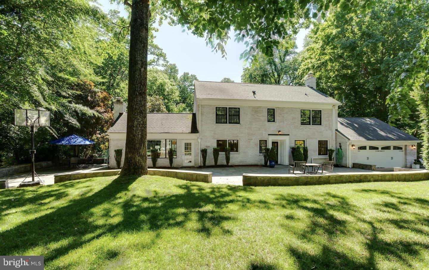 OPEN HOUSE SUNDAY, JUNE 7, 1:00-3:00.  Private and picturesque .83-acre cul-de-sac lot in the highly sought-after Eagle Rock neighborhood in the Langley, Cooper school pyramid.  For outdoor enthusiasts, just moments from the Langley Swim and Tennis Club and adjacent to Scott's Run Park, immediate access to Trails.  A stunningly renovated and expanded kitchen, a true showstopper designed by Unique Kitchens and Baths in 2022 as featured in HGTV Magazine. With quartz countertops, a JennAir refrigerator, and an upscale Ilve induction range with a double oven, this space is as functional as it is beautiful. . The thoughtfully updated bathrooms,  hardwood floors, and custom-built ins throughout. Newer double-hung windows and numerous other updates and improvements, over $300K just within the past 5 years.
Updated family room just off the kitchen outfitted with built-ins, wood fireplace and a wet bar with Sub Zero beverage fridge with direct access to the stone patio.  Perfect for entertaining large crowds or family dinners.  Formal living and dining room combination with a second wood-burning fireplace.

The expanded primary suite, complete with an updated and expanded luxurious en-suite bathroom, spacious walk-in closet.  Two more spacious bedrooms complete this level along with another updated bath.  Secret room off the nursery bedroom for a bonus playroom or additional storage.   The versatile fourth level  currently serving as an office/bedroom with a spacious walk-in closet.
The finished walkout lower level, featuring a gym, an additional bedroom, and a full bath—ideal as a private suite for an au pair or visitors. Outside, the oversized stone paver patio, charming stacked stone walls, and thoughtfully designed walkways create an inviting setting for outdoor gatherings, surrounded by mature trees and lush landscaping.  Updates: Kitchen 2022, both chimneys revamped/improved (2019),  Basement renovation (2020), windows (2015) primary and secondary baths, family room bar and built-ins (2022).
Located on a cul-de-sac street filled with unique homes, this property offers the perfect balance of tranquility and accessibility. With easy access to Georgetown Pike, I-495, Tysons, and Washington, D.C.