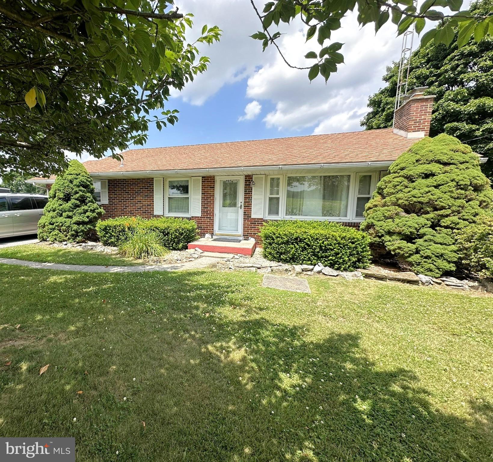 Great location south end of Hanover, all brick 3-bedroom house with lower-level guest room, 2 full baths one on each level.  You’ll find a custom Oak kitchen with dental and crown molding, raised panel cabinets, lots of storage and a nice corner sink with a working exterior view. The main level has beautiful Oak flooring, a large living room with a fireplace and picture window overlooking farmland with turkey and deer habitat.  This home has 2 heat sources, a heat pump with central air and a hot water baseboard heating system with 2 zones. The home has a 200-amp electric system, thermal tilt in windows and a blacktop driveway with parking for 5 cars.  This transaction includes 2 tracts, a .31 acre with the house and a .24-acre tract unimproved adjacent to the house tract.  There is a rear covered patio 21’ x 38’ as well as 2 nice sheds with electric one is 14’ x 20’ and the other 12’ x 16’ with a 15’ x 19’ lean to.  The lower level has approx. 837 finished sq. ft..  Personal property included: Refrigerator, built in oven, electric 4 burner stovetop, hood, electric dryer, washer and window blinds/treatments.  Seller would like to settle September 3 or 4th, 2026.