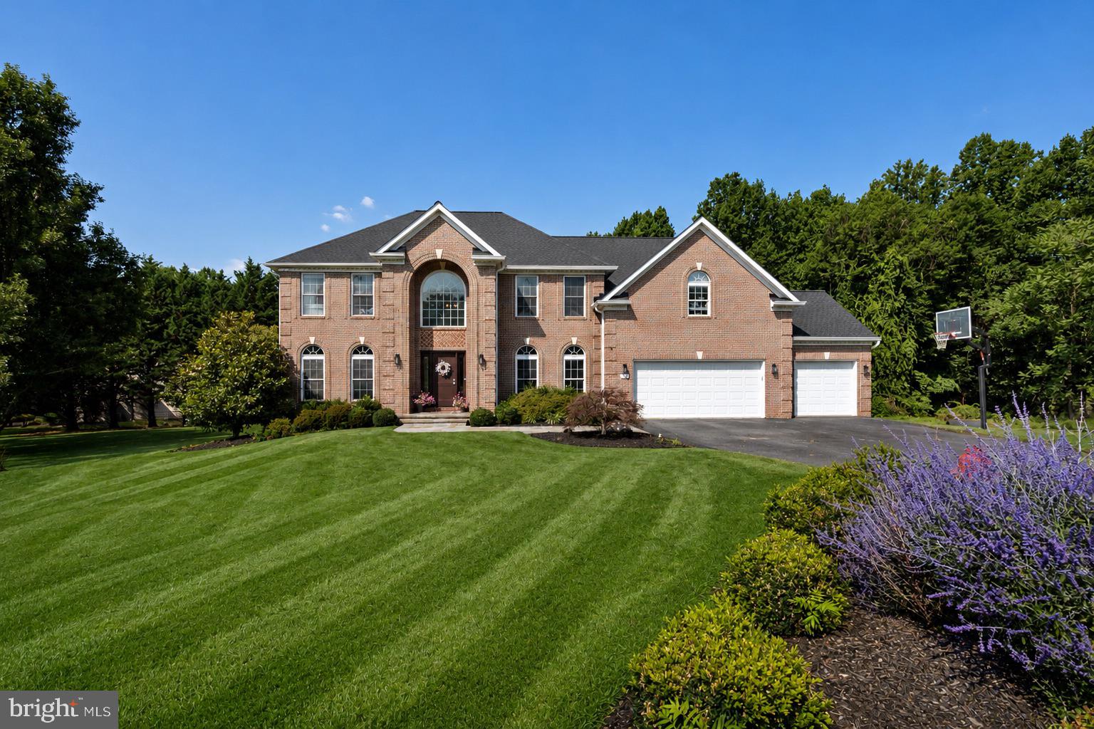 Welcome to 5562 Moriarty Court in sought-after Sherlock Holmes Estates! Situated on a private 2.44-acre cul-de-sac lot, this spacious brick-front colonial offers over 5,800 finished square feet with 5 bedrooms and 4.5 baths. The main level features a recently renovated gourmet kitchen that opens to the family room, along with formal living and dining rooms and a private office. Upstairs, the spacious primary suite includes a sitting room and two walk-in closets. The finished walk-out lower level offers a full bath & plenty of flexible living space. Recent updates include a new roof in 2026, stove, refrigerator,  dryer, and washer. Enjoy the peaceful wooded setting from the screened porch or deck, all while being just minutes from shopping, restaurants, and commuter routes. Seller requests a rentback after settlement