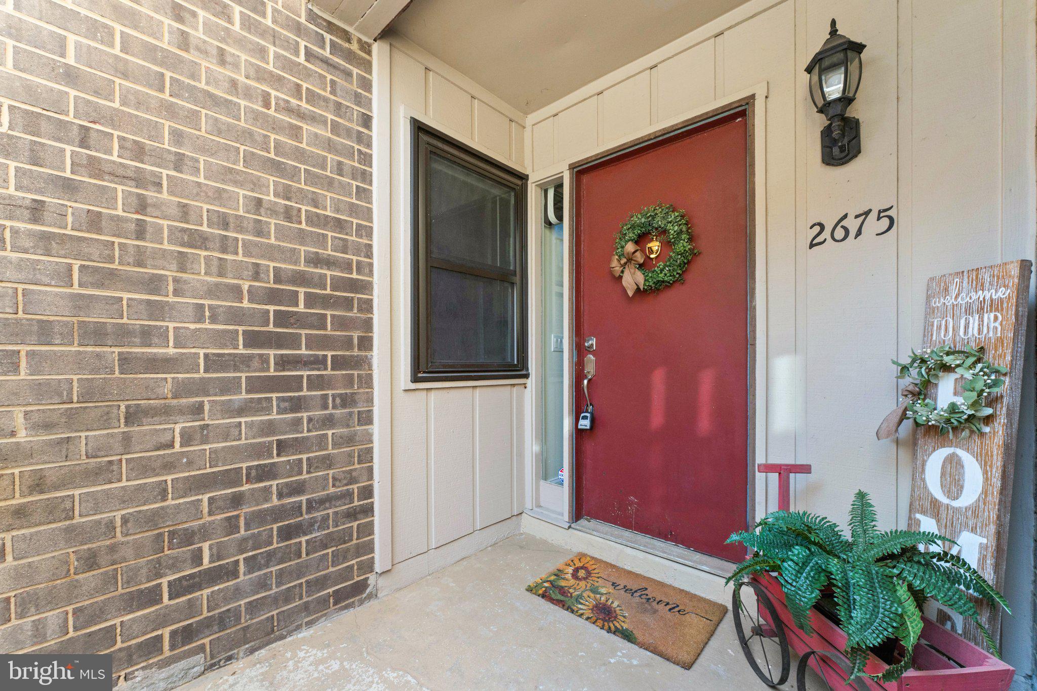 Price Improvement!   Cute and Cozy Updated Condo!  Welcome Home to this light-filled open-floor condo in the heart of Vienna!  This lovely 2-bedroom condo has been updated with luxury vinyl plank (LVP) flooring.  There are stainless steel appliances, a French-style refrigerator, a built-in microwave, a farmhouse stainless sink, butcher block countertops, ceramic tile, and a herringbone tile backsplash.  Both bathrooms have been updated.  The bedrooms have ceiling fans and LVP flooring, which are freshly painted, a walk-out level patio with a privacy fence to relax.  Water is included in the condo fee.  Realtors: Please review the agent's remarks before making an offer, including the assigned parking spot and additional visitor spots.