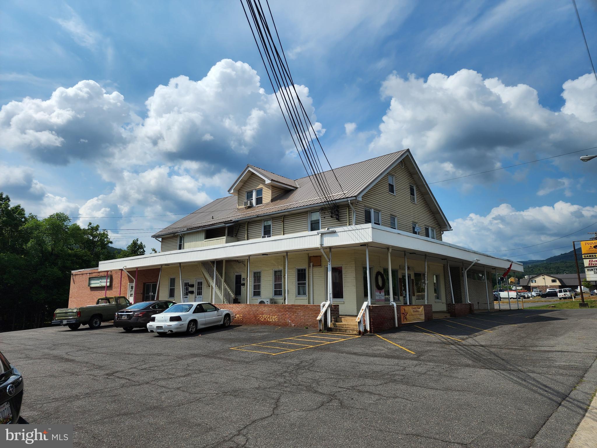 HIGH TRAFFIC, HIGH VISABILITY! Boasts of 8 units with total of  3,219 square foot Commercial & residential space for sale. Handicap Accessibility, Paved Parking, Signage on National Hwy, Surrounded by other booming businesses (Bank, Retail, Medical, Service, and more.) Space consists of Outdoor Sports, Crafts, Dance, 3 vacancies plus 3 residential units. The possibilities are endless here!! Make your appointment today!