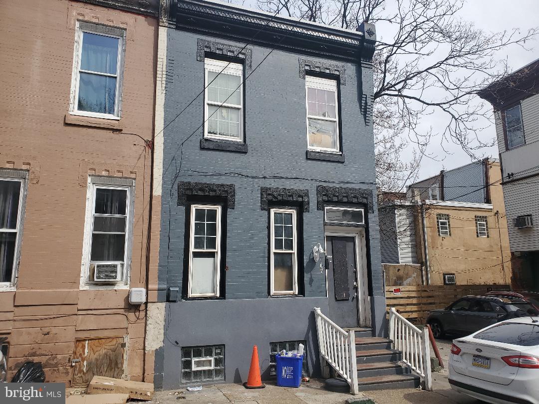 Zoned CMX2 this property is currently set up as a duplex. Close to Temple University. 1 Bedroom Unit 1 Bath on 1st Floor,  2 bedrooms 1 Bath on 2nd Floor. Small Patio out back of First Floor unit.  In Need of TOTAL renovations - Sewer Line Backed up in basement - Serious Investors only, Use Caution when Showing.