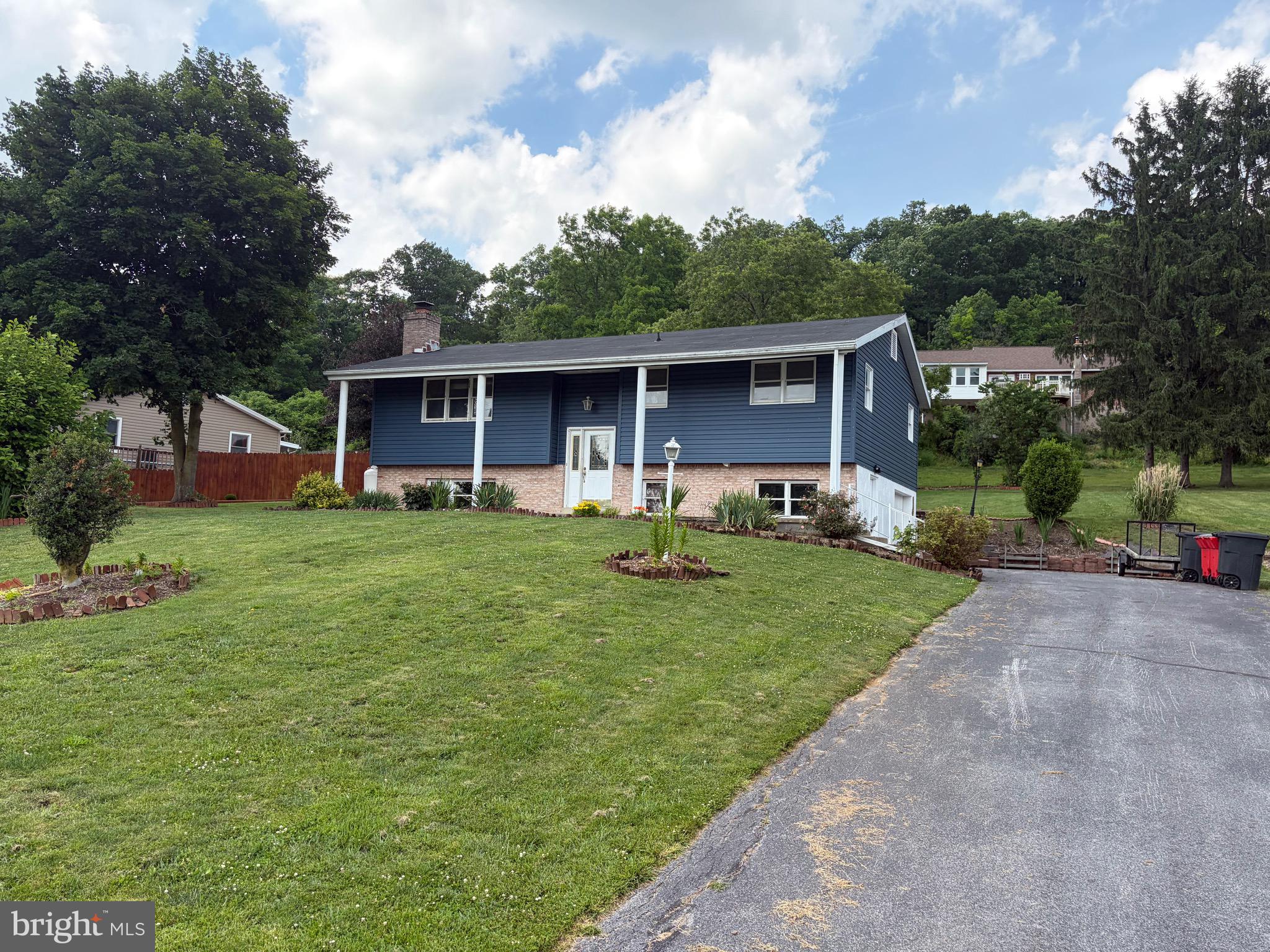 Home is located in a desirable development - lovely Pleasant Acres.  Walkable to Mifflin County high school and Mifflin County Junior High. Very close to Lewistown hospital as well. Just minutes from 322, approx 25 miles to State College.  3 bedrooms & full remodeled bath on main level - family room & half bath on lower level (could be fourth bedroom) Laundry hook ups on both levels.  1 car integral garage.  Newer siding, roof & rear covered deck all in 2023 & new 10x20 shed in 2024. Water heater new in 2022.    Move in immediately.  Natural gas lines recently added to the development - opens up more heating / cooling options.  Recent survey done.