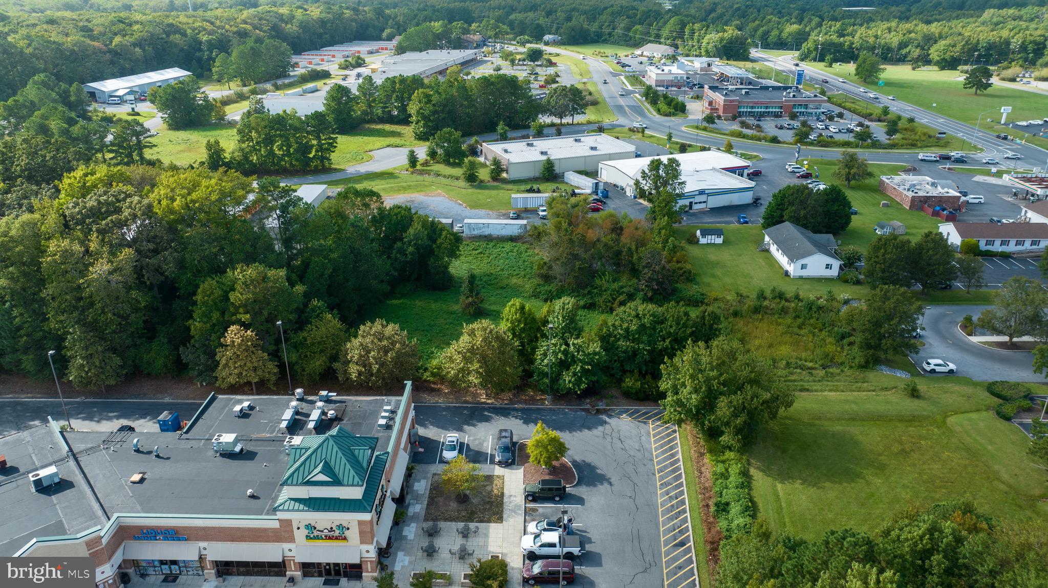 Location. Location. Location. Prime Opportunity in Ocean Pines, MD! This expansive 1.36-acre commercial lot, zoned C-2, is perfectly located to bring your business vision to life. With 1 EDU included, the property is ready for water and sewer—an essential bonus in this desirable area.   Access to the property is from 589.  A possible inter-parcel connector (Shown in Picture) would allow, if approved by the county, direct access from the Food Lion shopping center, enhancing visibility and accessibility. The spacious buildable area makes this property ideal for a range of commercial uses. Additional EDUs are available for purchase.
