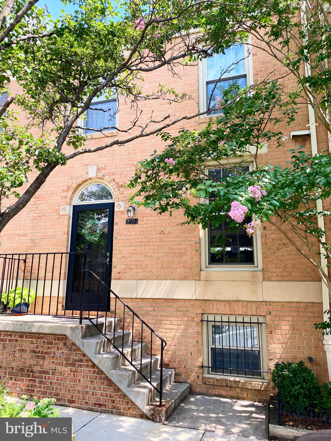 This Is A Beautiful Canton, Open Concept Townhome, With 4 True Bedrooms, 3 Full Baths And 1 Half Bathroom Located Just Half A Block Away From Canton Waterfront.  Walk In and Be Greeted By A  Lovely Upgraded Kitchen With Stainless Steel Appliances, Granite Countertops, Tons Of Cabinets With Under-lighting, And A 4 Stool Breakfast Bar To Enjoy Your Morning Coffee. The Main Floor Is Completed With A Living Room and Dining Room Area With a Beautiful Wood Burning Fireplace And Access To New Deck With A Grass Yard & Landscaped Garden. Walk Upstairs & Immediately Be Greeted By High Vaulted Ceilings, Beautiful Hanging Lights And A Skylight That Radiates Throughout The Upper Level. Upper Level Also Includes Spacious Master Bedroom With Walk In Closet, Remote Controlled Lighting & Fan, & Full Master Bathroom With Custom Frameless Tile Shower Stall Complete With A Bench.  The Second Story also Boasts 2 More Bedrooms With Vaulted Ceilings, Along With A Second Full Bathroom. In the Basement, We Have An Additional 4th Bedroom With Built In Closet Space, Completed With A Large Family Room, Kids Reading Nook, 3rd Full Bathroom and Laundry Room With New Dryer And Built In Storage. Added Bonuses To This Property Include: One Deeded Parking Space Plus A Second Guest Parking Pass. Rear Yard For Entertainment, A New Hot Water Heater, A Quiet Tree Lined Street, Blocks From Canton Square With Tons Of Shops & Restaurants & Access To All Major Highways.