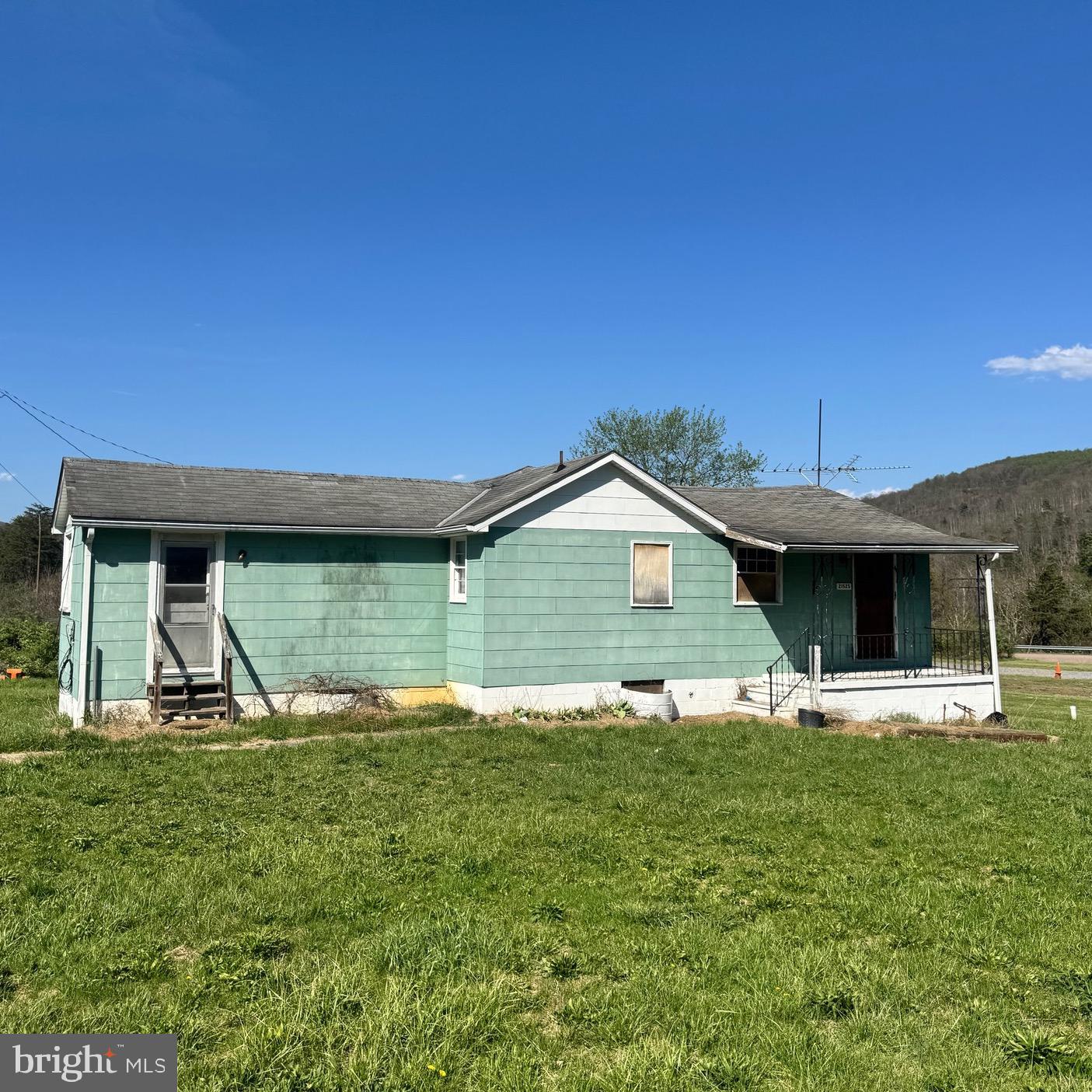 If you're looking for off-the-chart potential in a peaceful rural setting, this property has it! With convenient on-and-off access to Interstate 68, traveling throughout the tri-state area is simple while still allowing you to enjoy the quiet atmosphere of country living. Whether you’re searching for your next investment opportunity, a potential Airbnb, or a relaxing weekend getaway, this property presents a variety of possibilities. This 2-bedroom, 1-bathroom cottage features a functional layout with space that can be refreshed and tailored to suit your needs over time. The basement provides valuable storage, including an additional room ideal for tools, equipment, or seasonal items. Outside, the spacious yard offers room to relax, garden, or simply enjoy the surrounding countryside. With a location approximately two hours from Baltimore, Washington, D.C., and Pittsburgh, this home appeals to those seeking an accessible escape from city life. Don’t miss your chance to create a cozy retreat or income-producing getaway in a peaceful setting! Schedule your showing today!