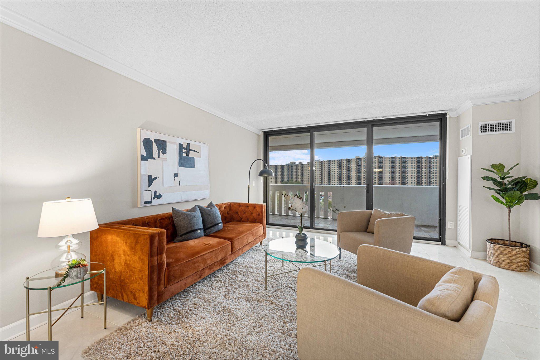 Welcome to high-rise living at its finest in the sought-after Alexandria Knolls West community! This beautifully maintained 2-bedroom, 2-bathroom condo, perched on the 14th floor, offers 1,405 square feet of bright, open living space and breathtaking west-facing panoramic views.

Sunlight pours in through wall-to-wall sliding glass doors, seamlessly blending indoor comfort with the beauty of the outdoors. Step onto your expansive 40-foot private balcony — the perfect setting for morning coffee, evening sunsets, or entertaining guests.

Inside, the kitchen is designed to impress with granite countertops, stainless steel appliances, and ample cabinet space. The spacious primary suite is a true retreat, featuring dual walk-in closets with custom built-ins and a generous en-suite bath complete with a double vanity. The second bedroom is equally versatile, ideal for guests or a home office.

Recent updates include energy-efficient sliding glass doors and new AC units (2020 & 2024). The home also includes an in-unit full-size washer and dryer, an assigned covered parking space, and a dedicated storage unit.

All utilities (except internet, phone, and TV) are included for a truly worry-free lifestyle. Alexandria Knolls West residents also enjoy a full suite of amenities: two fitness centers, a swimming pool, hot tub, saunas, a lounge, and a party room.

Perfectly located for commuters, with easy access to I-395, I-495, Van Dorn Metro, Old Town Alexandria, and Washington, D.C. — plus proximity to the Mark Center, Fort Belvoir, Fort Myer-Henderson Hall, Joint Base Andrews, Joint Base Anacostia-Bolling, the Pentagon, the National Guard Bureau, and Quantico.

Don’t miss your chance to own this exceptional home. Schedule your private tour today and experience elevated living!