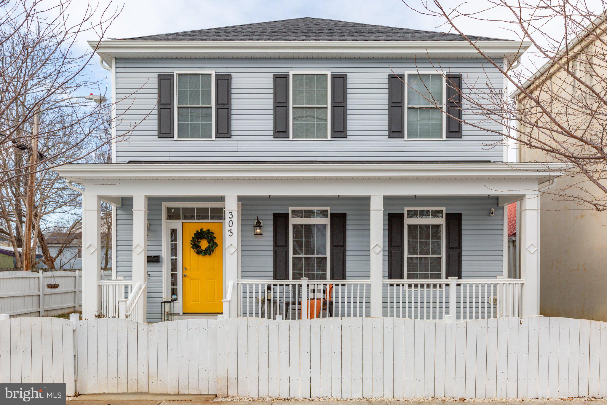 Discover the perfect blend of urban convenience and contemporary design in this stunning 2018 custom-built home, nestled in a prime location just steps from the river and canal. Designed with a busy lifestyle in mind, this 2018 home offers an open, airy layout that is both functional and inviting. This "best of both worlds" option has the modern conveniences of a new home and the charm of living in the city.

Outdoor Charm Meets Warm Welcomes
Step through the gated front yard and onto the cozy front porch – the ideal spot for your morning coffee or an evening place to unwind. Inside, the bright and spacious living room offers a versatile sitting area, perfect for a home office, reading nook, or for entertaining guests.

Gourmet Kitchen for Culinary Enthusiasts
The heart of the home is the gourmet kitchen, adorned with rich Espresso cabinetry, upgraded countertops, and an island that seats four comfortably. With abundant built-ins, a dedicated coffee or cocktail bar, and extensive counter space, this kitchen was made for hosting and culinary creativity. Adjacent is a light-filled dining area, framed by windows and opening to a private deck for alfresco dining.

Comfort and Functionality Throughout
The family room provides ample space for relaxation and opens to the oversized side-load garage, accessible via the side alley and fenced yard. A convenient half bath and secondary entrance near the foyer add functionality. You may wish to use this as your main entrance, or just another way to enter the home when you're enjoying the fenced yard. It offers lots of possibilities.

Spacious Bedrooms and Luxurious Primary Suite
Upstairs, the primary suite is a retreat, featuring a sunlit bedroom, a generous walk-in closet, and an ensuite bathroom with a jetted tub, dual vanities, and a custom tile walk-in shower. Down the hall, three additional bedrooms and two full baths provide space for family and guests. The oversized fourth bedroom doubles as a potential recreation/game room, and a separate laundry room keeps chores hassle-free. All the bedrooms are generous in size and have ample closet space, too.

Outdoor Space and Prime Location
The fully fenced yard offers privacy and a blank canvas for gardening or outdoor fun. Parking options include an oversized garage and sidewalk spaces. Situated within walking distance of local shops, restaurants, an art gallery, brewery, and distillery, this home provides a vibrant community atmosphere. Enjoy nearby canal paths for biking and walking, and benefit from easy access to the VRE, hospital, and I-95.

This move-in-ready home combines modern living with unbeatable convenience. Schedule your tour today and make it yours!