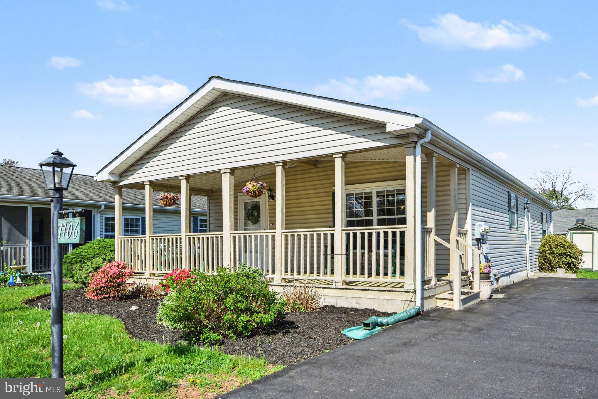 Enjoy easy, low-maintenance living in this beautifully maintained 3-bedroom, 2-bath home located in a desirable 55+ community in North Wales. Refreshed driveway with brand new asphalt coating. Thoughtfully updated with new luxury vinyl plank flooring in the kitchen and bedrooms, plus brand-new neutral carpeting in all three bedrooms, this home is move-in ready and waiting for its next owner.
A welcoming covered front deck provides the perfect place to enjoy morning coffee, visit with neighbors, or unwind at the end of the day. Inside, the bright and functional kitchen features white appliances including a gas range, refrigerator, dishwasher, and double-bowl sink. A distinctive center island with built-in display cabinetry adds both character and storage. The kitchen flows seamlessly into the spacious living area, creating an inviting space for everyday living and entertaining.
The primary bedroom suite offers a comfortable retreat with two closets and a private bath featuring a walk-in shower with built-in seating, grab bars, a large vanity, linen storage, and ample counter space. Two additional bedrooms provide flexibility for guests, hobbies, or a home office. A second full bath includes a tub/shower combination and vanity.
Additional highlights include a convenient laundry area with stacked washer and dryer, extra storage cabinetry, a heater closet, and a side entrance providing easy access to the driveway and yard. A storage shed offers even more room for seasonal items and outdoor equipment.
Residents enjoy access to the community clubhouse and a convenient location close to shopping, dining, and major roadways. Just minutes from North Wales Borough, Skippack, Ambler, and the Montgomeryville shopping district, you'll have countless options for restaurants, entertainment, and everyday conveniences nearby.
Well maintained and ready for its next chapter, this charming home offers the perfect opportunity to enjoy a relaxed lifestyle in a welcoming community.