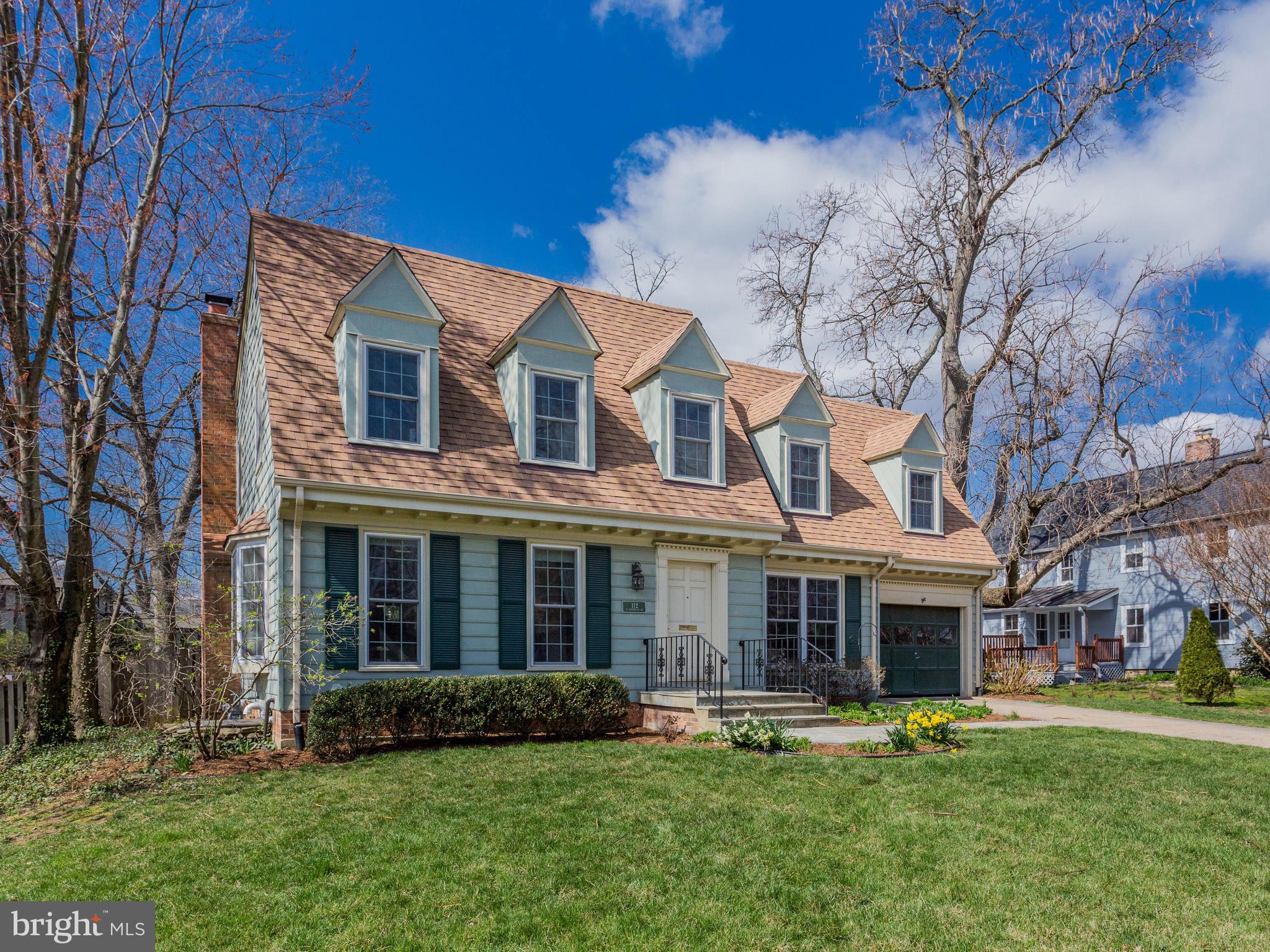 Located on one of the prettiest streets in Falls Church City, this 5 bedroom, 3.5 bath home is a true beauty with an amazing front and backyard and one car garage.  The house features 4 generous bedrooms on the upper level.  The primary bedroom has an ensuite bathroom and there is a nice sized full bath along with a laundry room on the upper level.  The main level is sophisticated and open with lots of natural light with both a formal living room and formal dining room and a recreation/breakfast room off a lovely kitchen.  French doors in the recreation room lead to the private and lush backyard.  The lower level has wonderful space for recreation, office and or workout area along with a full bedroom and full bath.  Great opportunity as is or possibly expand for future. Falls Church City Public Schools. Blocks to EFC Metro and walking distances to shops and restaurants.