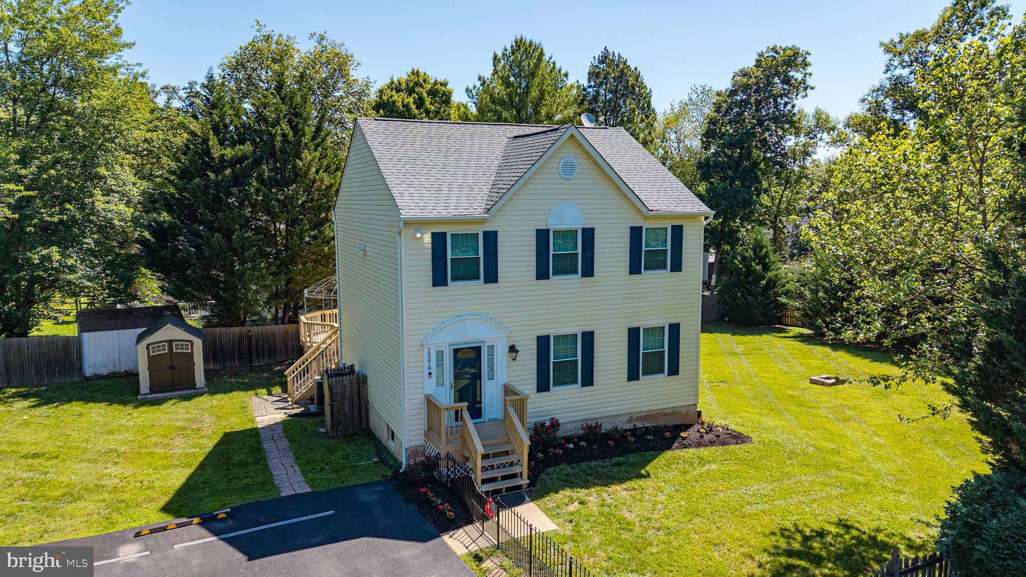 Charming 4 bedroom 3.5 bath home on large .42 acre FENCED lot in popular Pleasant Valley. NEW LVP flooring  on upper level. Hardwood on main level.  Bright updated  kitchen with island, granite, stainless appliances include wine refrigerator.   Gas stove! Access to spacious deck from the kitchen. NEW PRIMARY BATH.  Other baths have been updated in the last several years.  Finished WALKOUT BASEMENT features fourth bedroom with large egress window, kitchenette, family room and full bath Three TVs can convey.   HVAC 2020, Hot water heater 2026. Roof 2018.  Two sheds - one with electricity.  Expanded 3 car space driveway parking. NO HOA but pool memberships available to neighborhood pool.  Nearby walking trails through county parkland and to the Cub Run Rec Center.