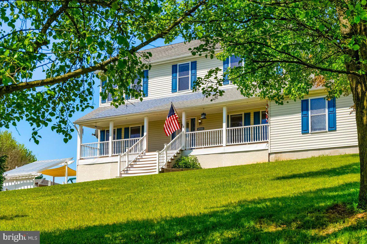 Please note our Price Adjustment!  Come see this exceptional Westminster colonial with value galore!
Custom-built by the original owner, this spacious home offers 3–4 bedrooms, 3  ½ baths and three finished levels on a generous lot with fantastic views.   Freshly painted so you don't have to!!  Carpet Allowance of $5,000 so you can personalize the carpeted spaces.
Highlights include: *Light-filled open kitchen with 42" maple soft-close cabinets, island, pantry and stainless Maytag appliances *Formal dining room with elegant cherry hardwood floors *Generous primary suite with en suite soaking tub and his and hers walk in closets *Huge 2 car attached garage and hybrid hot water system *Spacious finished lower level (Superior Walls foundation) with pellet stove, full bath, acoustical ceiling tiles and French doors to the backyard *Backyard oasis built for entertaining and family fun: *Above ground Oxygen pool with heater and slide – 4 foot to 6.5 feet on the deep end *Screened patio for evenings under the stars *Playhouse/shed, wooden playset, chicken coop and sun sail for shade and outdoor play
This home blends quality construction and thoughtful upgrades with endless indoor/outdoor living possibilities —pool parties and cozy movie nights. Welcome home!