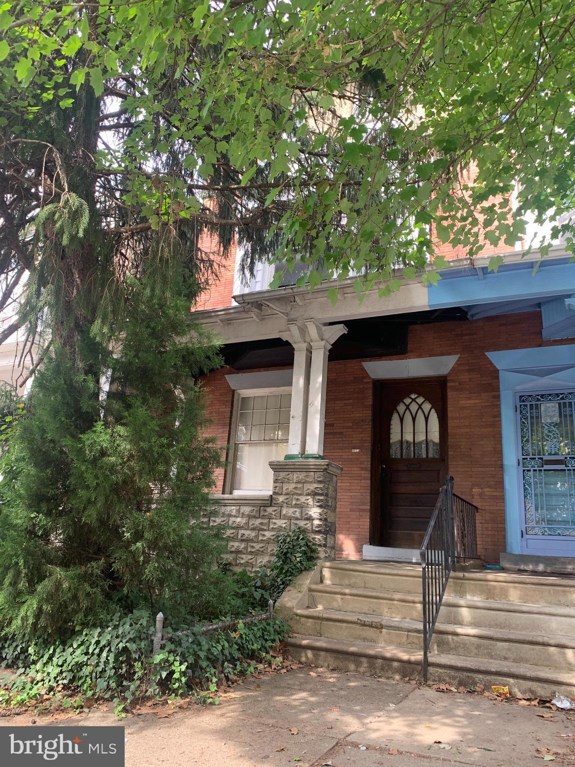 Exquisite example of old Philadelphia architecture ready for you to bring it to your new life  !
3 Story Twin home with lots of space, in a great neighborhood too. Old world charm awaits.
Covered Front Porch to enjoy the evenings, a custom wood door leads to the Vestibule and then step 
in to the Foyer with inlaid hardwood flooring and custom staircase, Living Room with decorative fireplace, large Dining Room. large Eat In Kitchen (with back stairs to 2nd floor), Mudroom with wash tub and Laundry hookups, door to rear Patio. SECOND FLOOR has Main Bedroom with bay windows, decorative fireplace & hardwood floors, 2 Additional Bedrooms , Hall Bath with claw foot tub. THIRD FLOOR has 2 Bedrooms, with full height all around. BASEMENT is unfinished, utilities & storage. Sold AS IS.