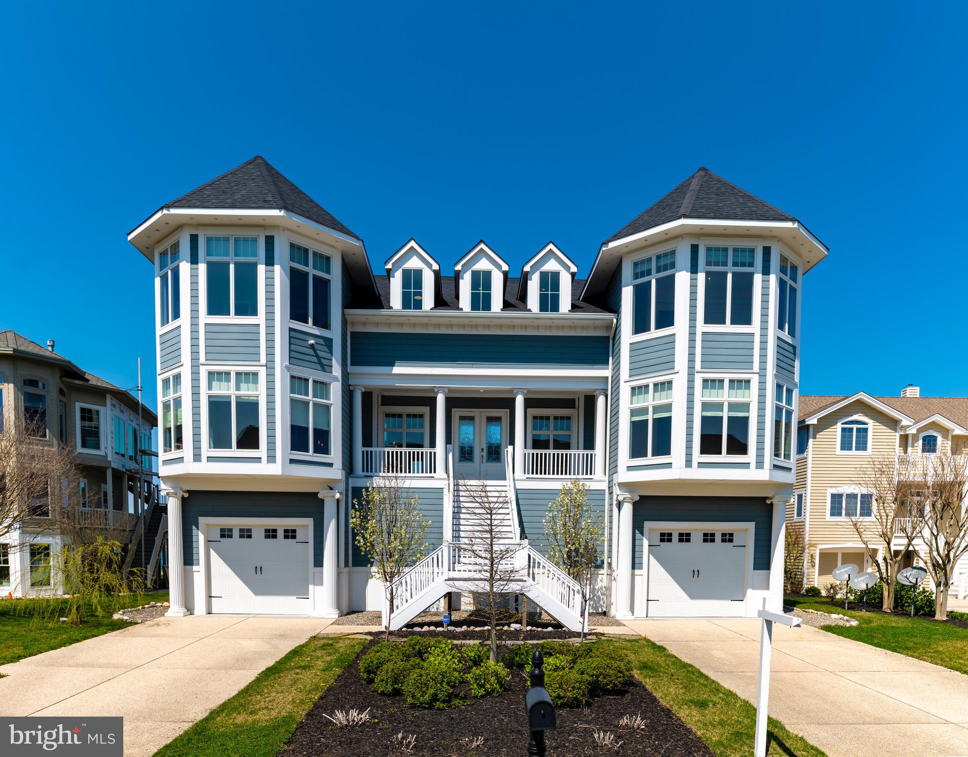 This unique home truly defines coastal lifestyle!  Located on the South Side of the Indian River Inlet. Within the protected boundaries of the State Park,  this home is only 5 miles from both Bethany and Rehoboth Beach.  The community of South Shore Marina is gated with amenities such as, a swimming pool, tennis courts, a clubhouse and a marina. The beach is accessible by bicycle, golf cart, on foot or by car (beach parking is provided by State Park.) Other activities include oceanfront dining and various State Park amenities along with a restaurant right down the street! After you've enjoyed a fun-filled day, it's time to go and enjoy your 12,000 sqft WATERFRONT home - newly built in 2016. There is a water view from every window! This home features 7 bedrooms, 6 full baths and 2 half baths.  Notable features include partial steel framing, Wolfe appliances, double laundry rooms (lower and upper floor) and an elevator. To say the least, this home is designed to entertain both families and guests and guaranteed to be the most spacious within this price point.  The open floor plan and cathedral ceilings create an extremely high end setting.  The owners built this home to personal standards that convey quality and craftsmanship at every corner.  You're invited to come see this home for yourself!