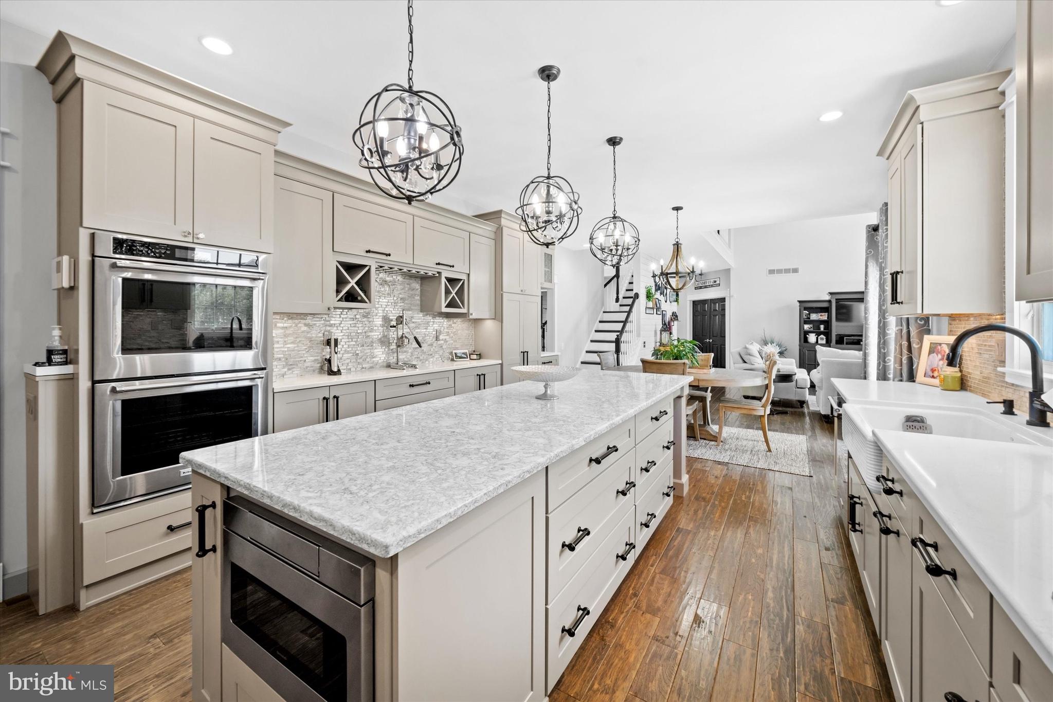 Offer deadline has been set for 9AM, Tuesday 5/6. 
 Beautifully updated and thoughtfully designed, 105 Betsy Rawls Drive in the prestigious community of The Legends, checks every box for style, function, and smart living. Hardwood floors run throughout both levels, complementing light-filled rooms and custom finishes like shiplap, plantation shutters, board and batten, and North Carolina molding. 
 
The completely renovated kitchen makes a statement with quartz countertops, stainless appliances, a double oven, oversized island with storage, porcelain farm sink, a stainless steel vented hood, and new Anderson slider connecting to the patio. The layout balances openness with defined spaces, including a formal dining room for special occasions, a front office ideal for focused work, and a stunning family room with cathedral ceiling, gas fireplace, and a wall of windows overlooking the backyard filling the space with natural light and pool views. 
 
Upstairs, smart design continues. The primary bedroom now features three walk-in closets, including a former sitting room reimagined into a stunning walk-in with a crystal chandelier blending storage and style effortlessly. The renovated primary bath delivers a spa-like feel, with an integrated tub and shower designed for side-by-side convenience and clean, modern lines. 
Three additional bedrooms offer flexibility, sharing an updated hall bath featuring a new tub, tile surround with niches, shiplap, North Carolina molding, and overlook views of the family room and backyard. 
On the main level, a smartly converted laundry offers endless cabinetry, a utility sink, and plenty of space perfect for everyday life.  
 
The partially finished basement adds more possibilities and ready for movie nights, workouts, or play. The large unfinished portion is perfect for storage. 
Outdoors, the backyard was designed to be more than a space,  it’s a destination. An epoxy-coated concrete patio,  natural gas hookup for the grill, shed addition, and a 18x35 salt water pool with fountains and slide create an upscale outdoor retreat. Paddle board yoga, peaceful lounging, or hosting friends, this pool does it all. 
 
Key updates: roof (2022), house addition for storage (shed), water heater/sump pump (2019), furnace & A/C (2016, both serviced 2024), front door (2024), pool pump (2018), and pool liner (2022). This is a home that has been well cared for and carefully upgraded  offering not just space, but peace of mind.  
Basement was finished without permit. Seller will not be obtaining one. 
Home Size and Tax Info provide by NCC parcel view website and Town of Middletown web site; Agent/Brokerage not responsible if any inaccuracies.