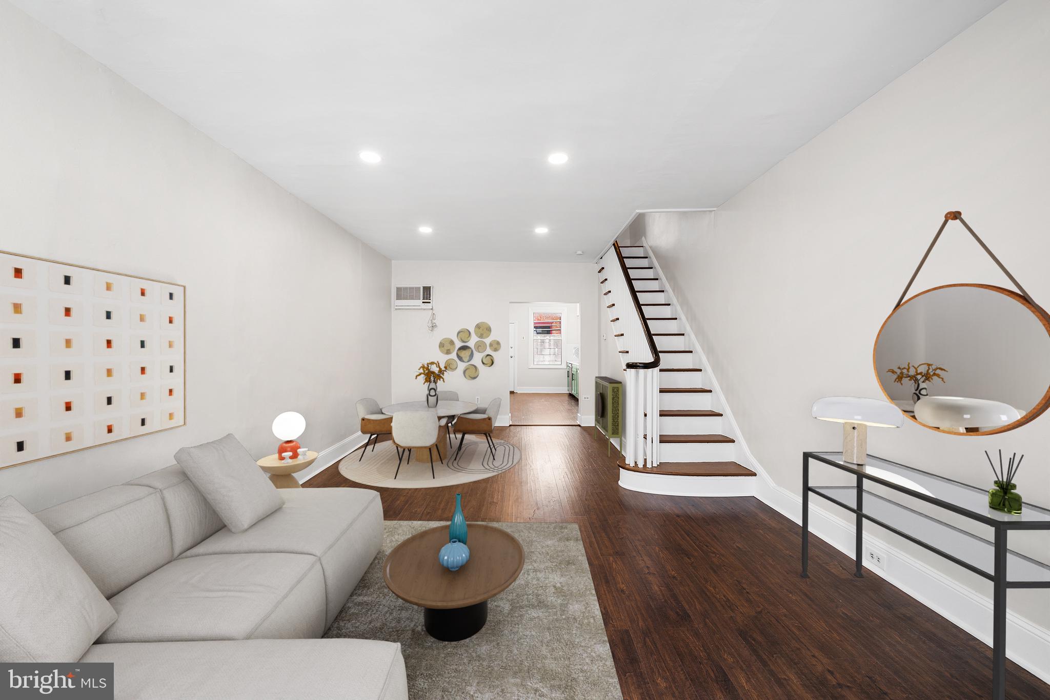 Welcome to 1834 S Carlisle Street, a charming and centrally located townhouse in the heart of Newbold. Just a short walk from East Passyunk’s acclaimed restaurants, cafés, and boutiques, and with immediate access to the Broad Street Line, the location of this property makes it easy to enjoy everything South Philadelphia & Center City have to offer. A vestibule with an overhead transom window welcomes you inside. The main level opens into a spacious living and dining area, where three front-facing windows fill the home with natural light. Warm LVP flooring continues from the freshly painted entertaining area to the sunny back kitchen, which has been recently upgraded with two-tone shaker cabinetry with contemporary black hardware and a carrara white quartz countertop,. The kitchen is complete with a gas range, a stainless steel dishwasher and refrigerator, and a microwave. A rear patio is positioned just beyond the kitchen; it’s the perfect spot for summertime BBQing, or even a container garden! The second floor offers three bedrooms, a full hall bathroom with a tub/shower enclosure, and a hallway closet. The large basement provides added storage space and houses the washer and dryer. In addition to freshly painted walls and new carpeting (2026), the house also features a new electric panel (2025), a new chimney (2024), new boiler electronics (2024), and other upgrades like a front door keypad lock, new bedroom door hardware, and more. The location is truly one of the home's standout features! Grab a coffee around the corner at Ultimo, enjoy neighborhood favorites such as South Philadelphia Tap Room, Stina, and Second District Brewing, or stroll across Broad Street to East Passyunk Avenue for acclaimed dining destinations including Laurel, Barcelona Wine Bar, Pizzata Pizzeria, and Bing Bing Dim Sum. Combining convenience, walkability, and neighborhood charm, 1834 S Carlisle Street is an excellent opportunity to enjoy the best of South Philadelphia living. Disclaimer: Tax and square footage data is not guaranteed and should be independently verified by the buyer their agent. Listing photos with furnishings have been virtually staged.